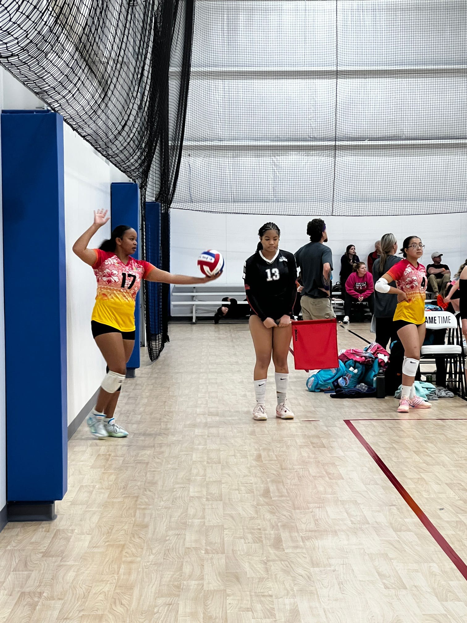 Club IMUA Volleyball athlete jumping during a volleyball rally