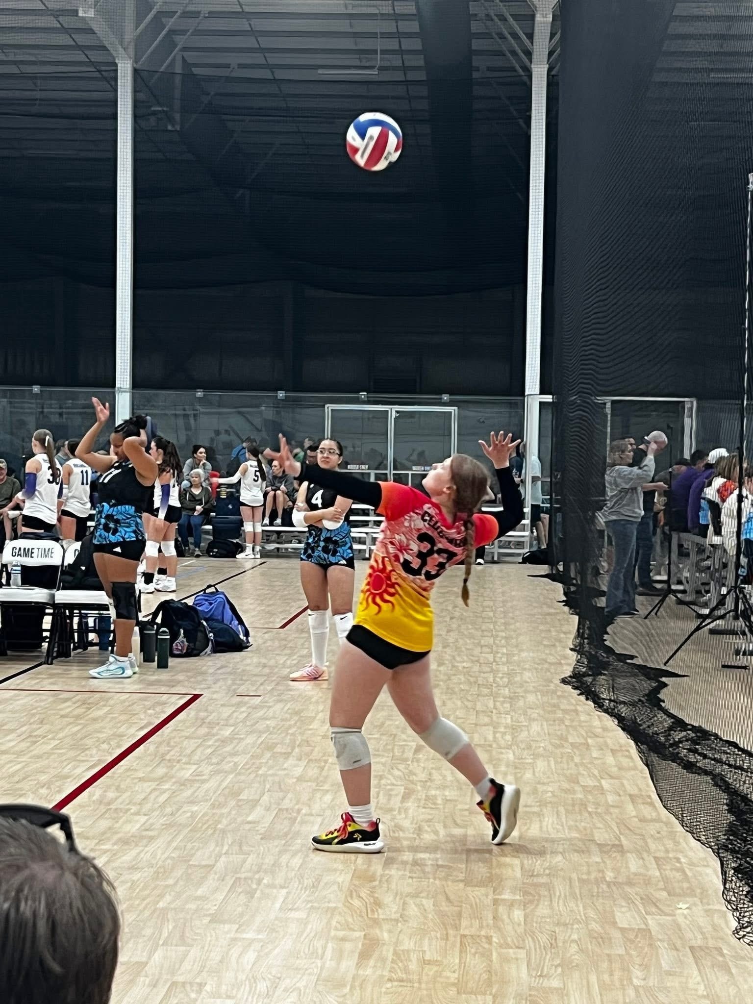 Club IMUA Volleyball athlete leaping during practice