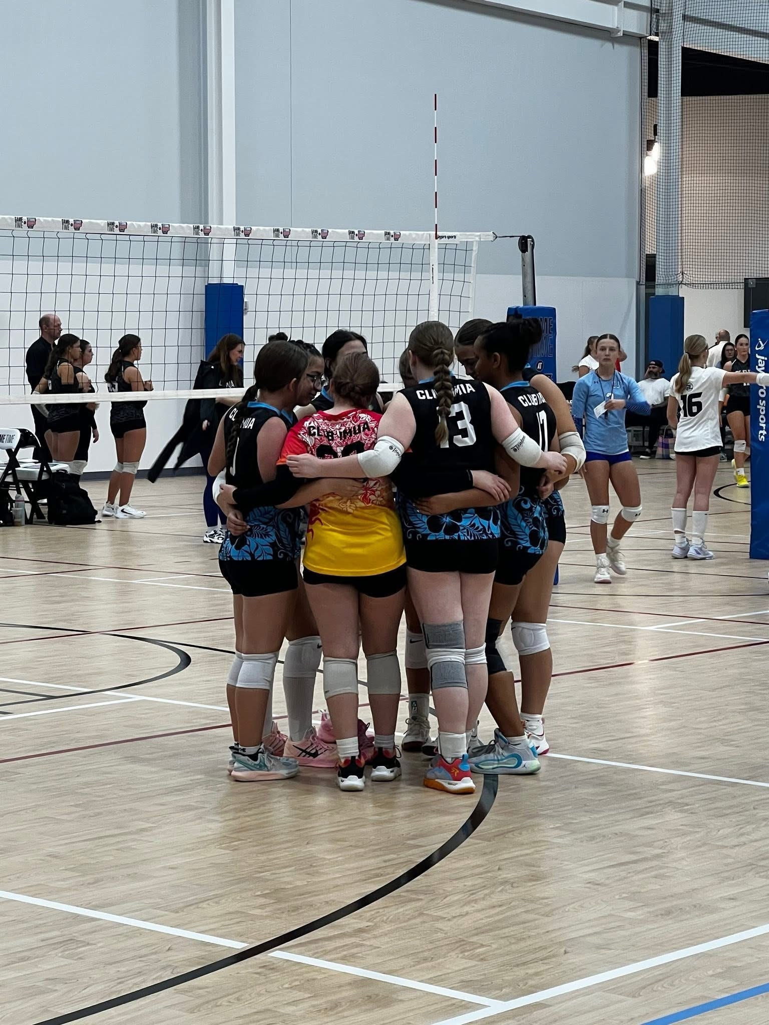 Club IMUA Volleyball athletes gathered together during practice