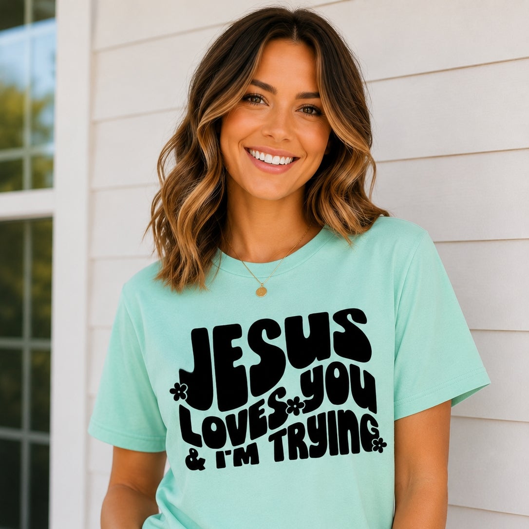 Jesus Loves you and I'm Trying Tee detail