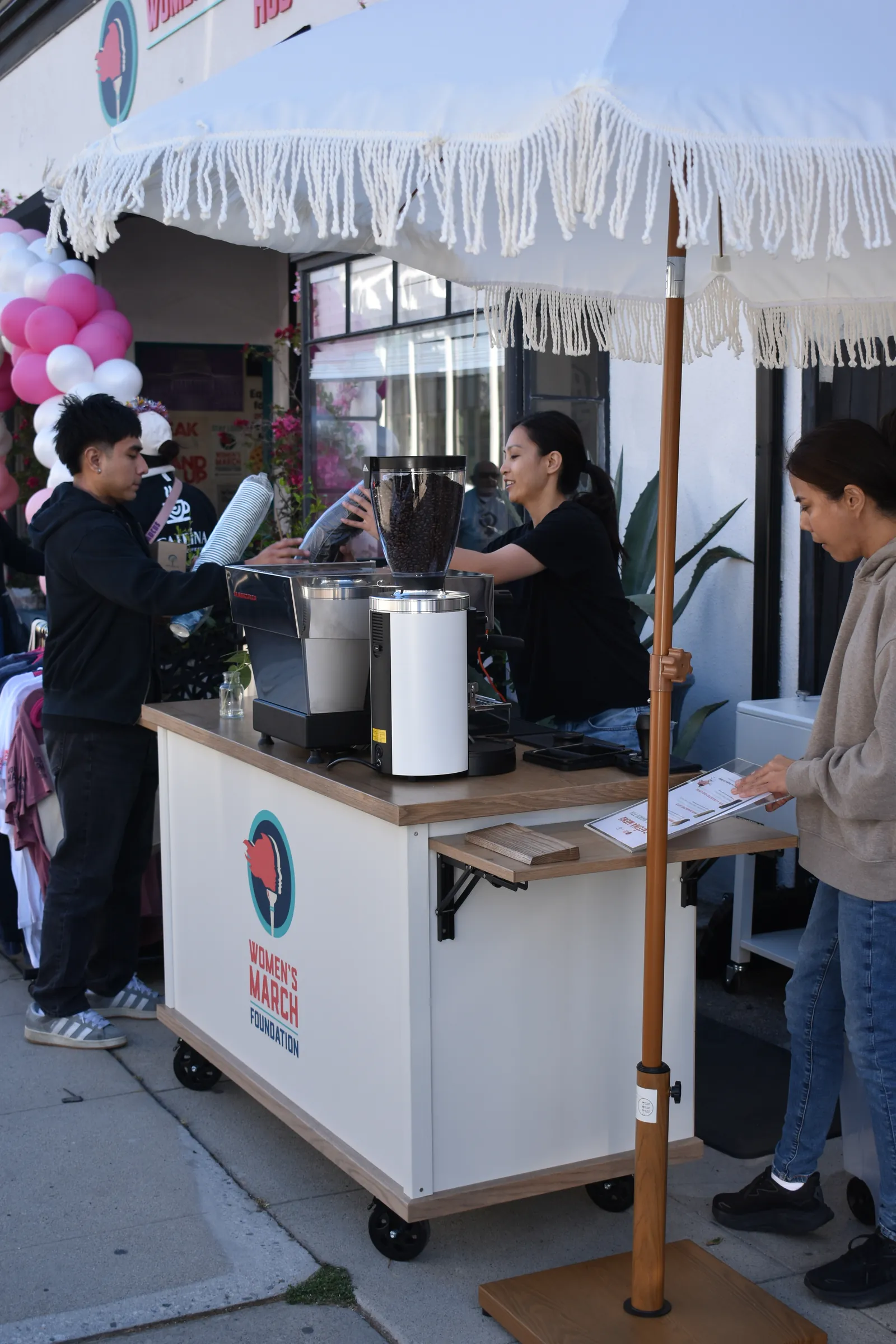 Caféina serving coffee at a Women’s March Foundation event