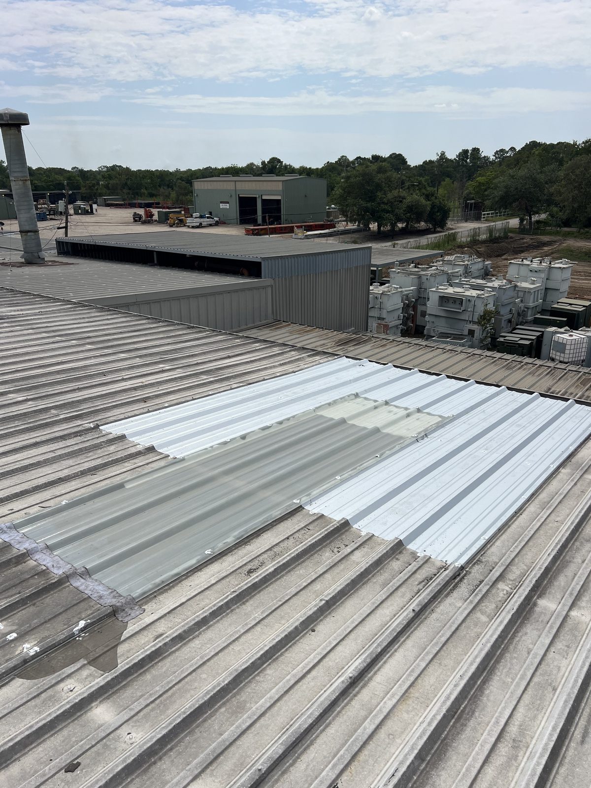Completed commercial roof panel repair