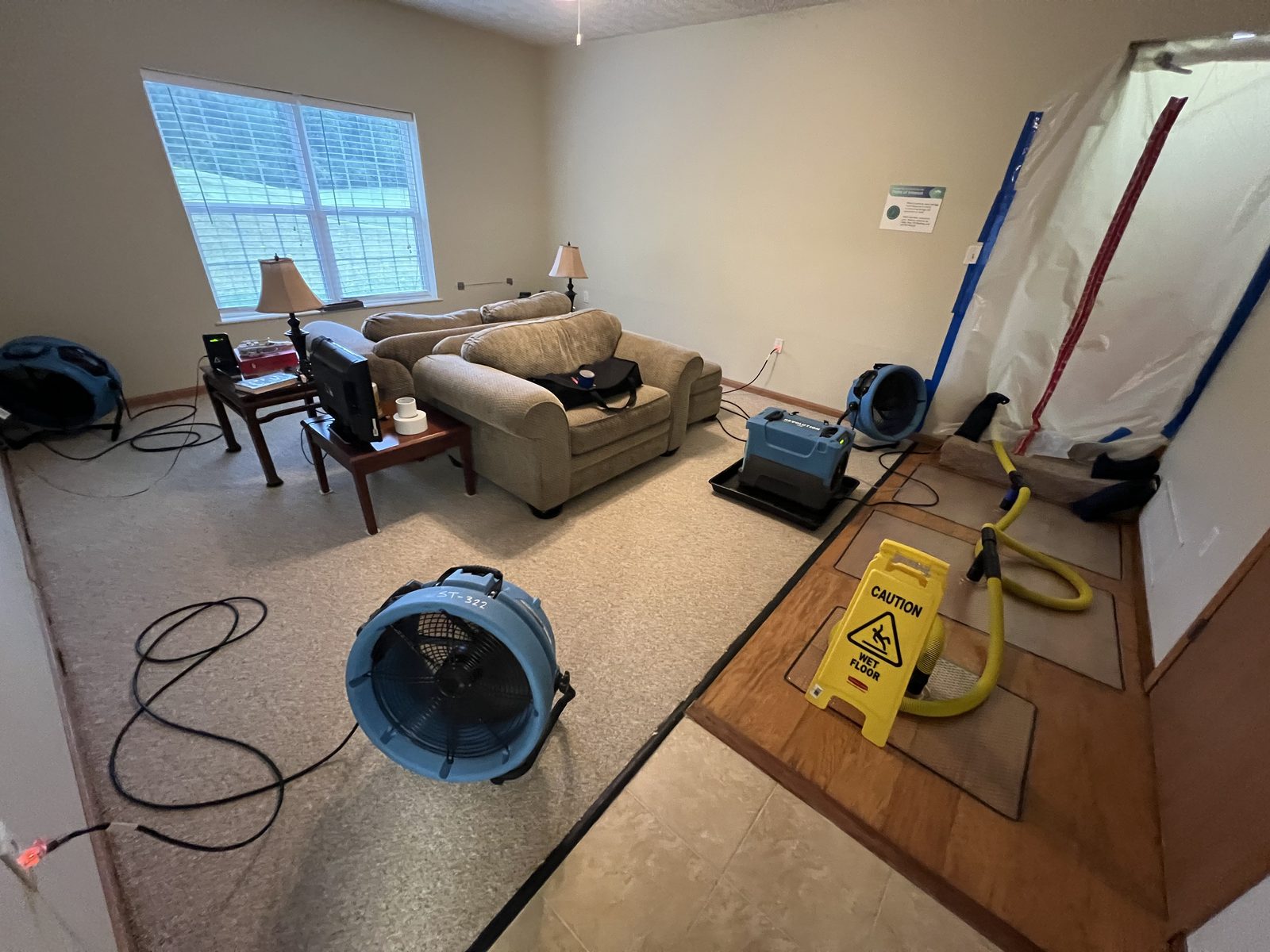 Water mitigation equipment set up inside a home
