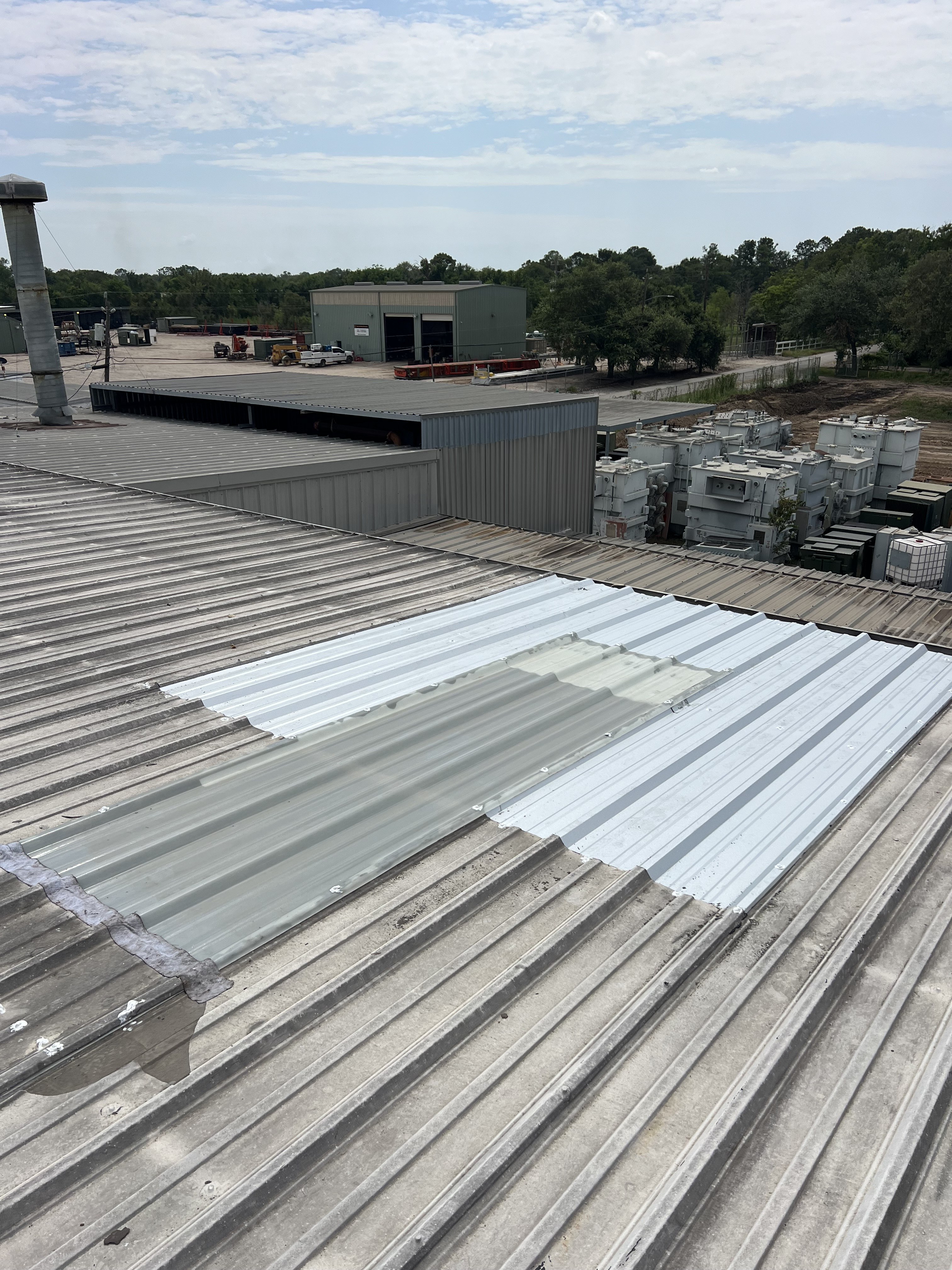 Completed commercial roof panel repair