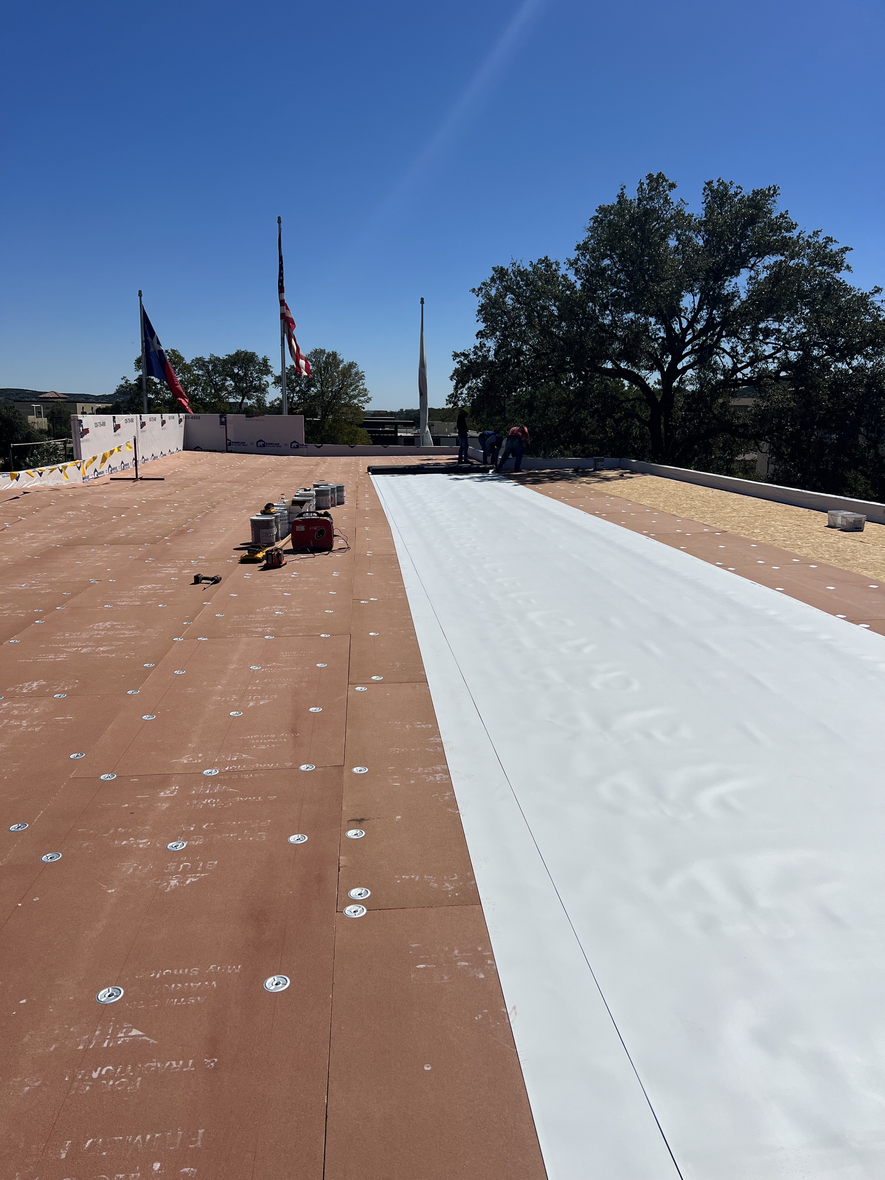 Commercial roof installation work in progress