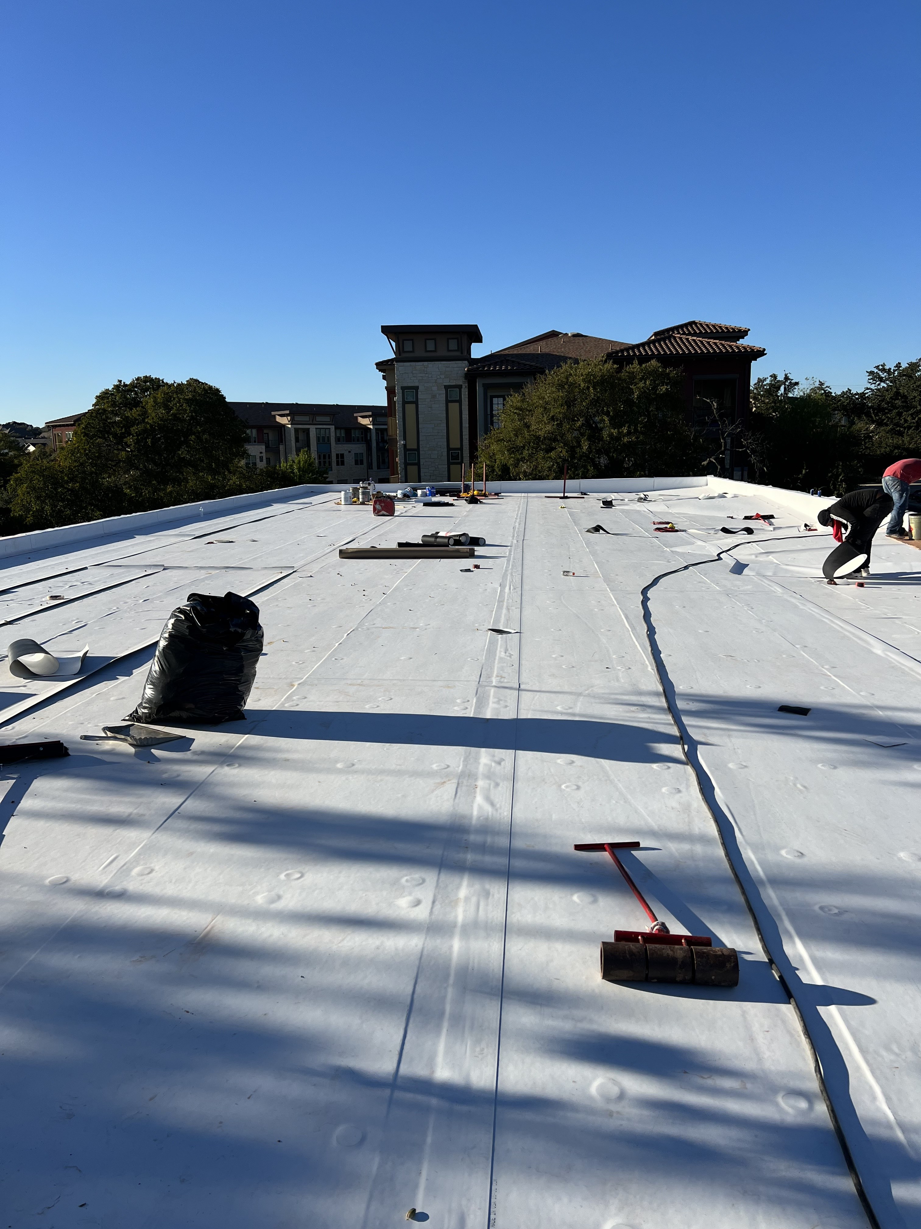Completed white commercial roof membrane