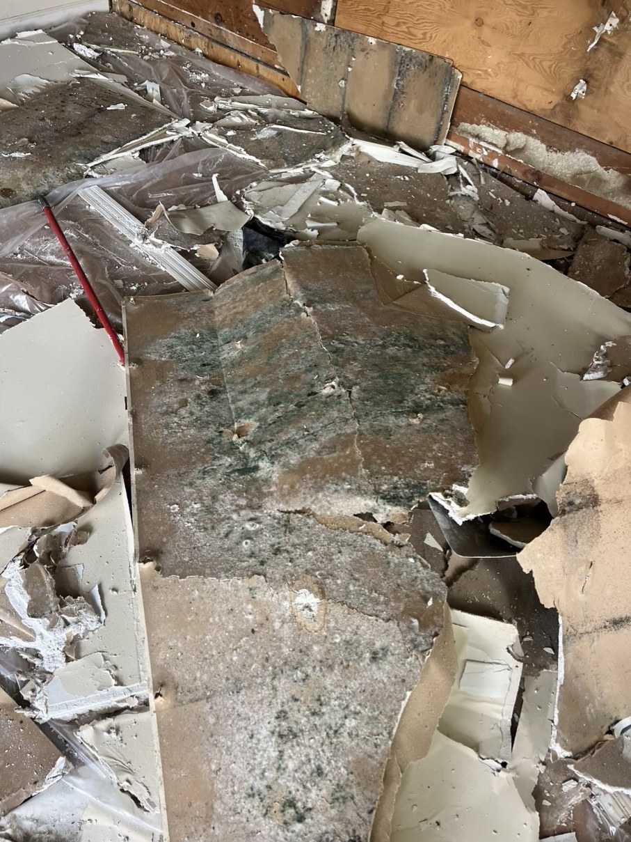 Damaged flooring removed during interior restoration