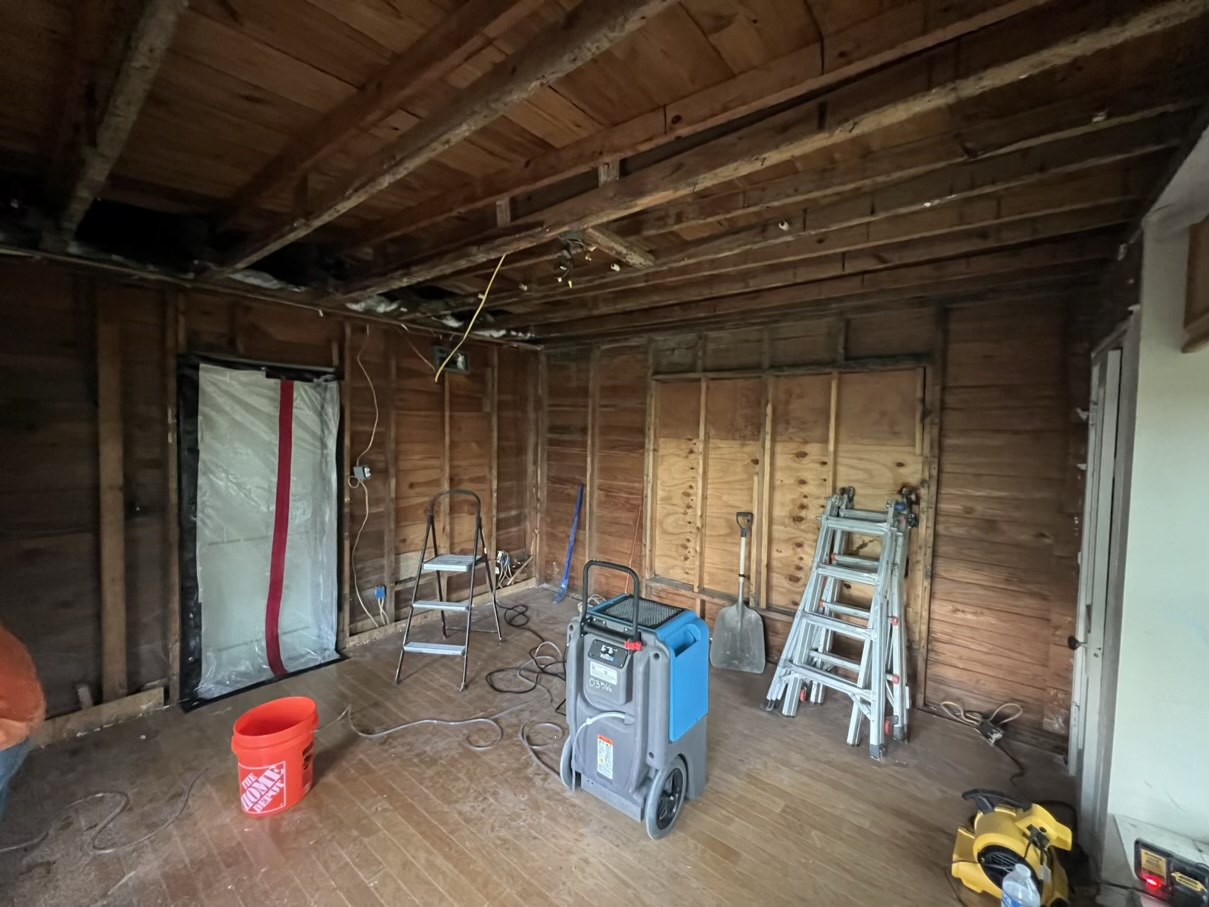 Interior framing and drying equipment during restoration