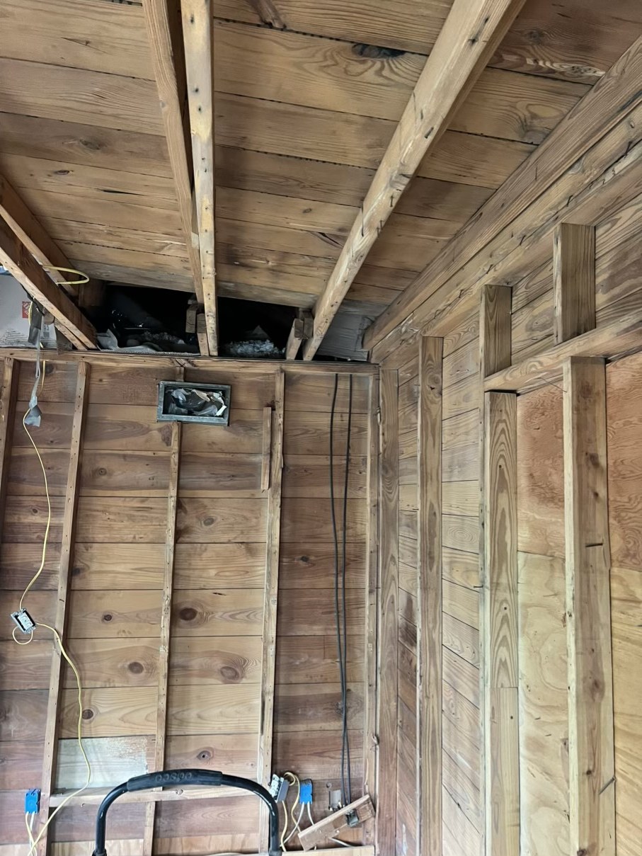Interior wall framing prepared for reconstruction