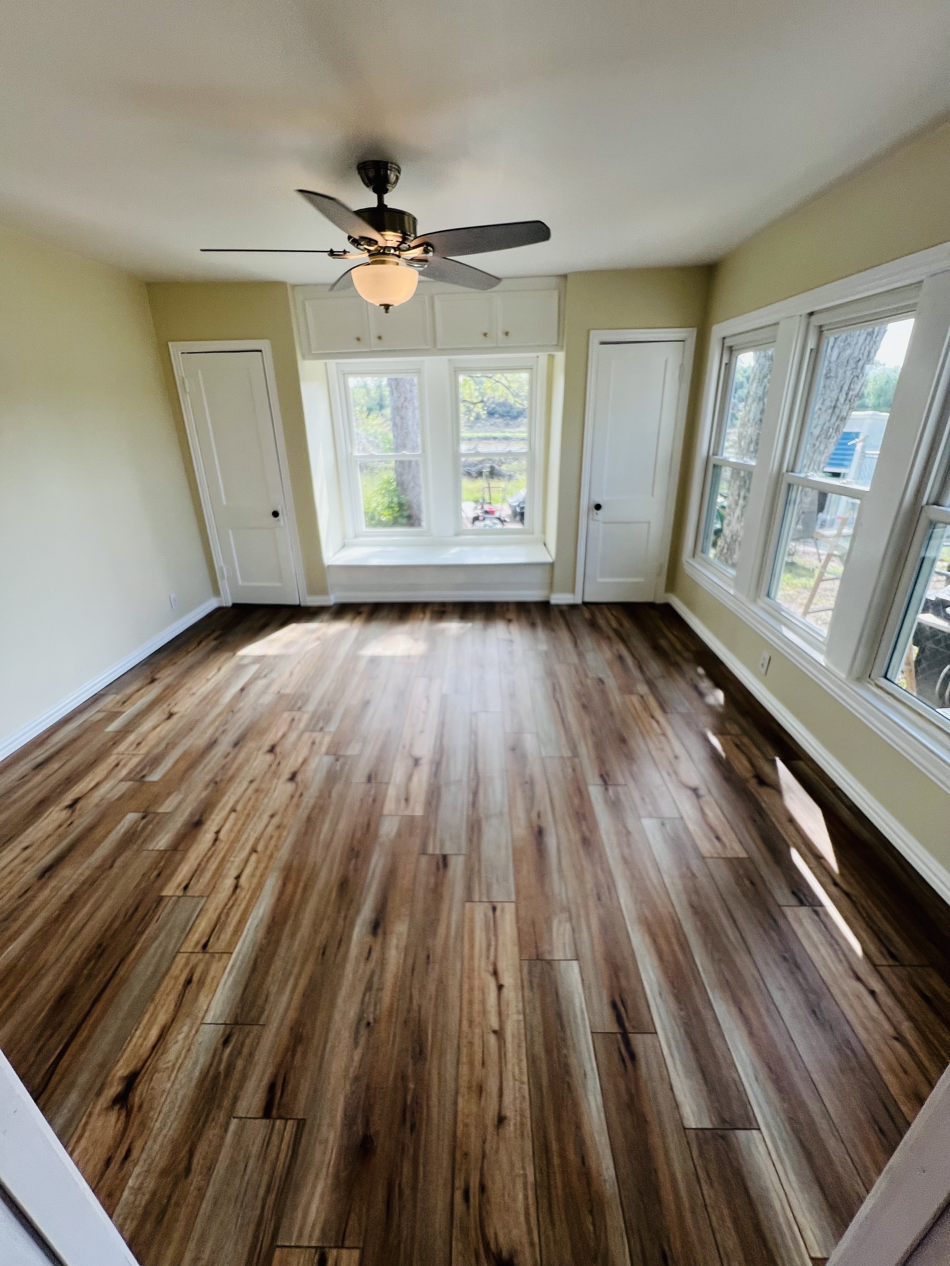 Completed interior restoration with finished wood floor