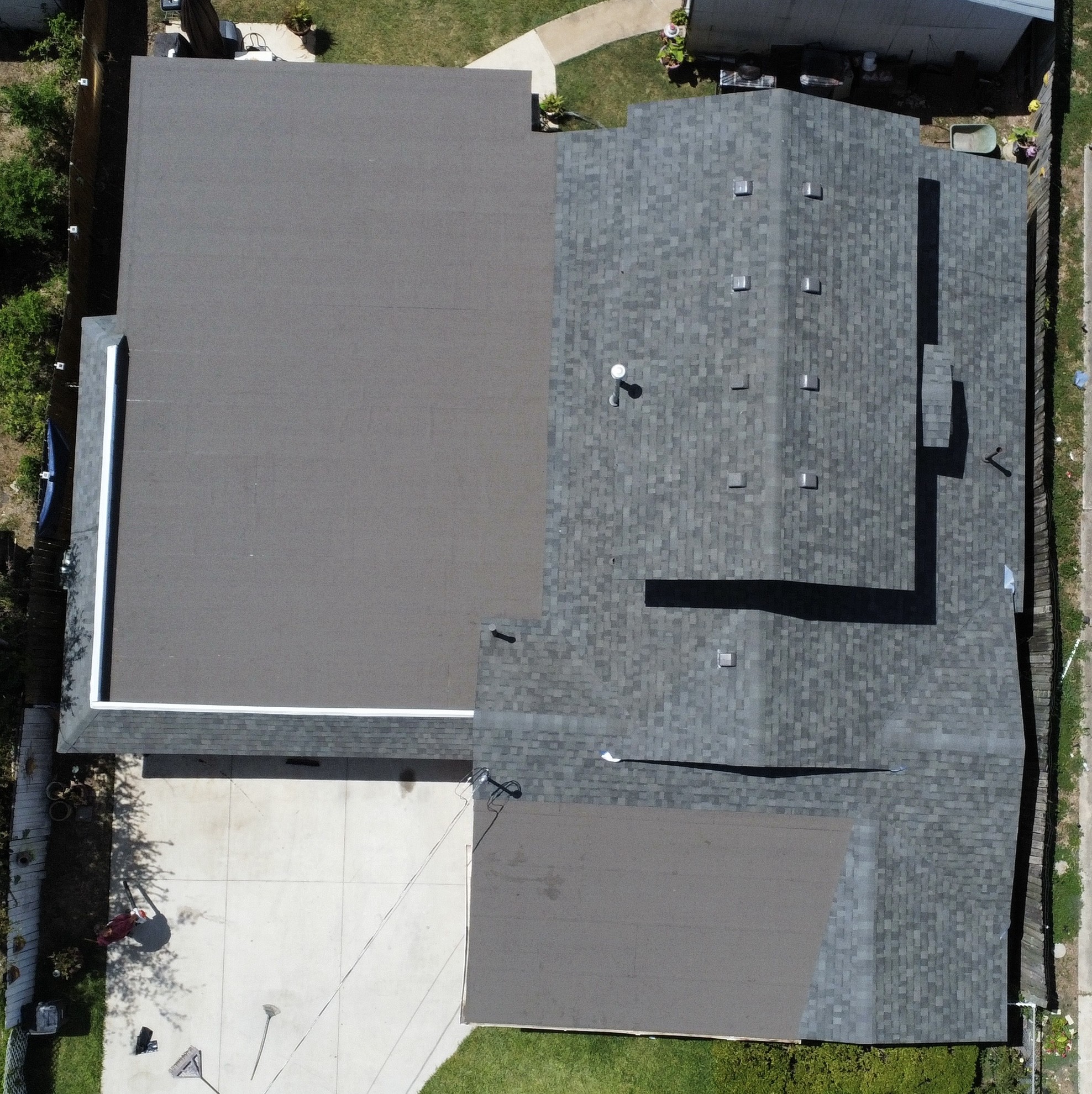Overhead view of completed residential roofing work