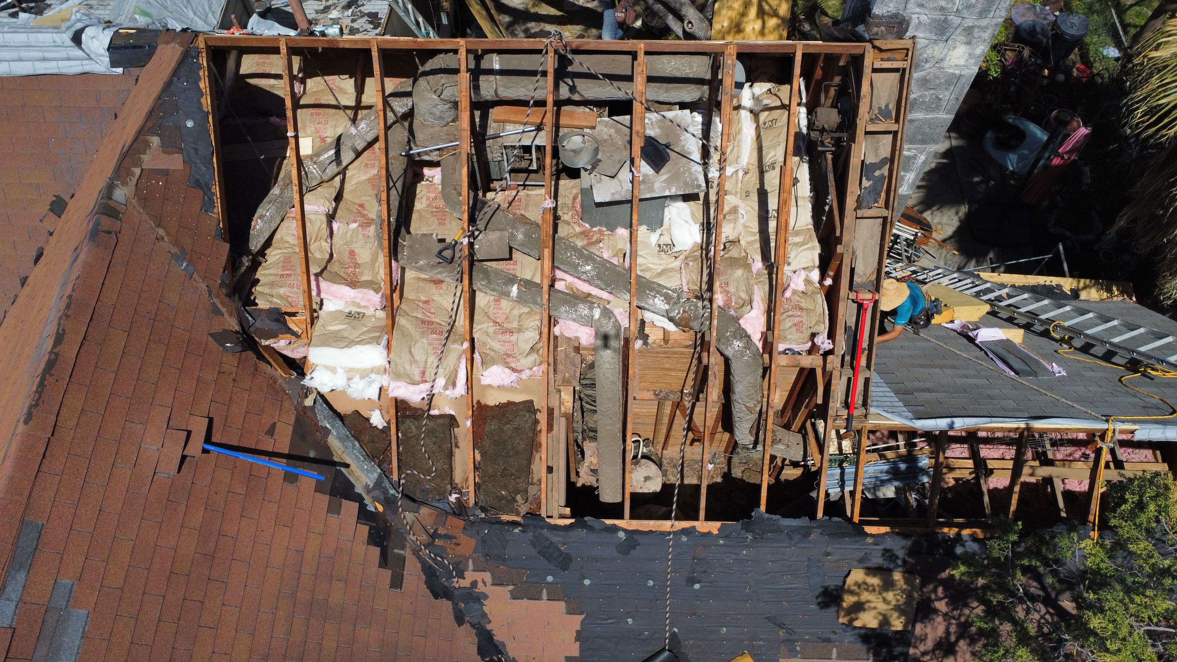 Exposed roof framing after storm damage