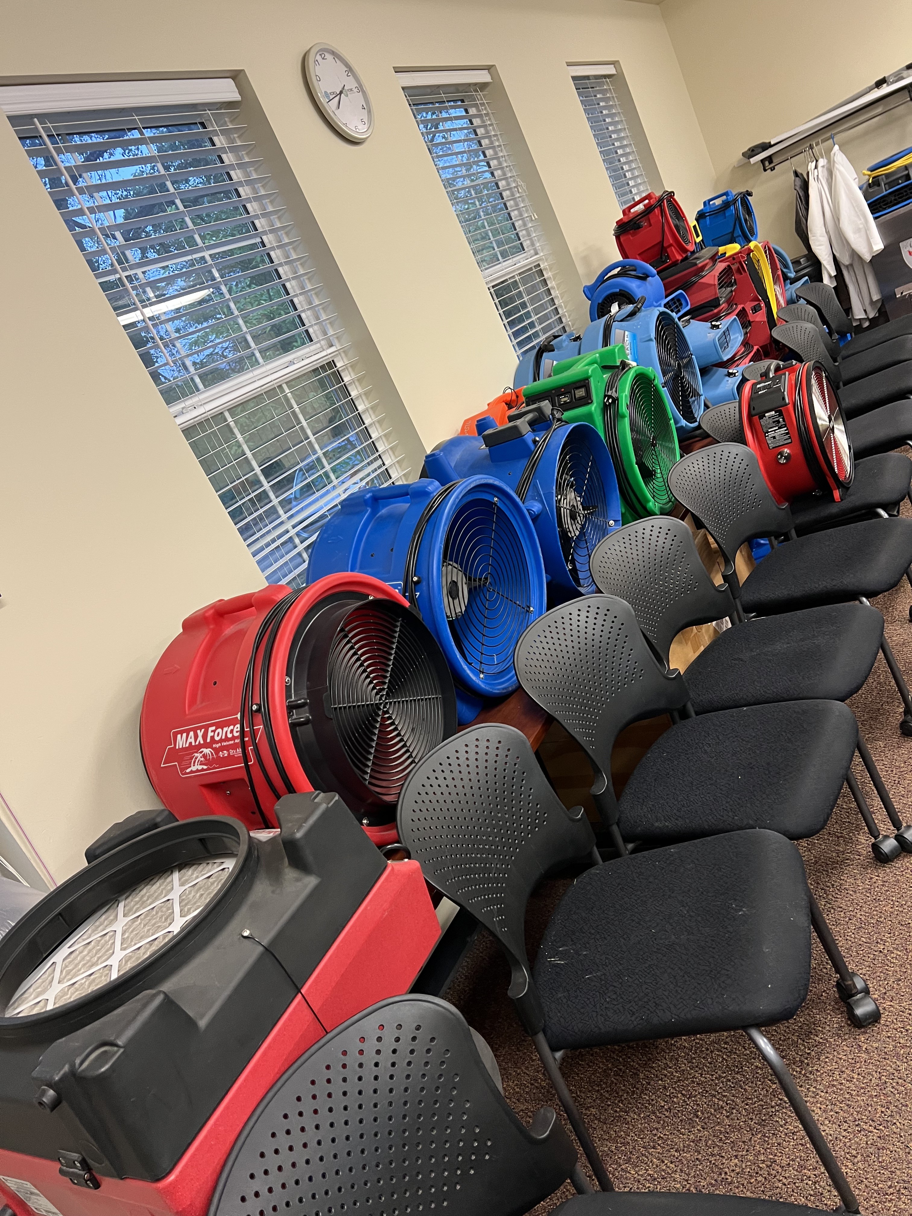 Professional drying equipment prepared for a water mitigation project