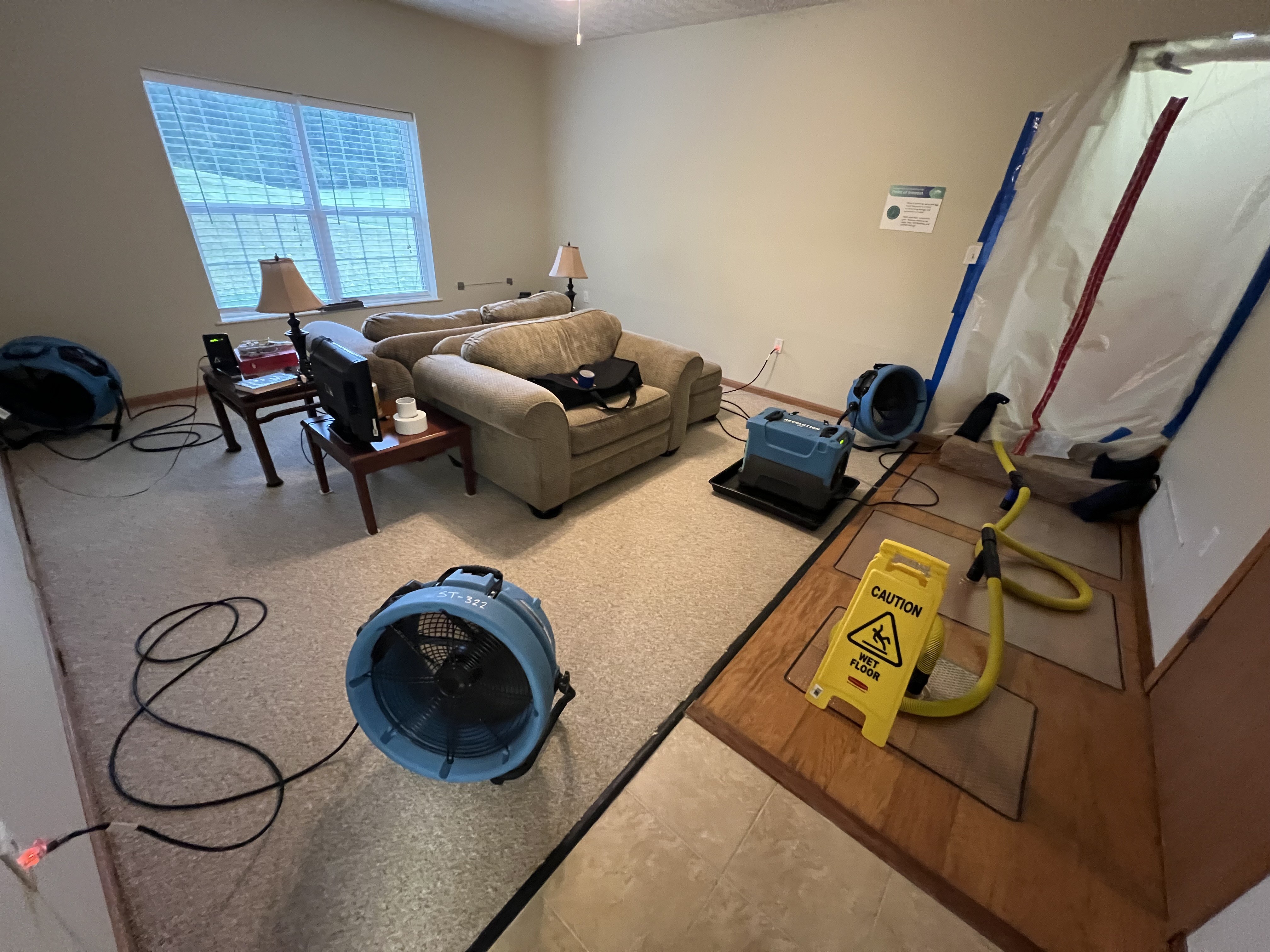 Water mitigation equipment set up inside a home