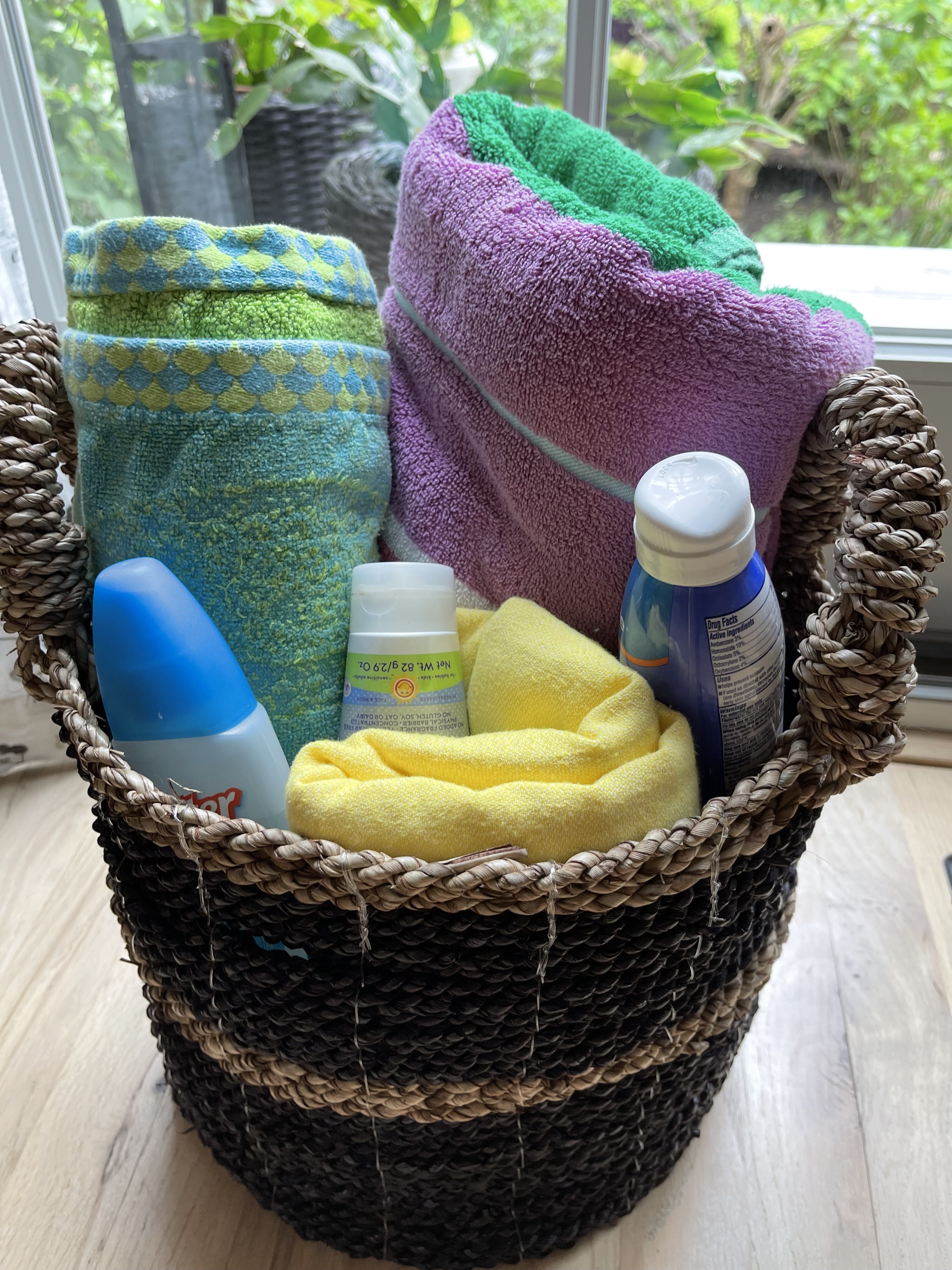 Beach tote with towels and essentials ready for guests