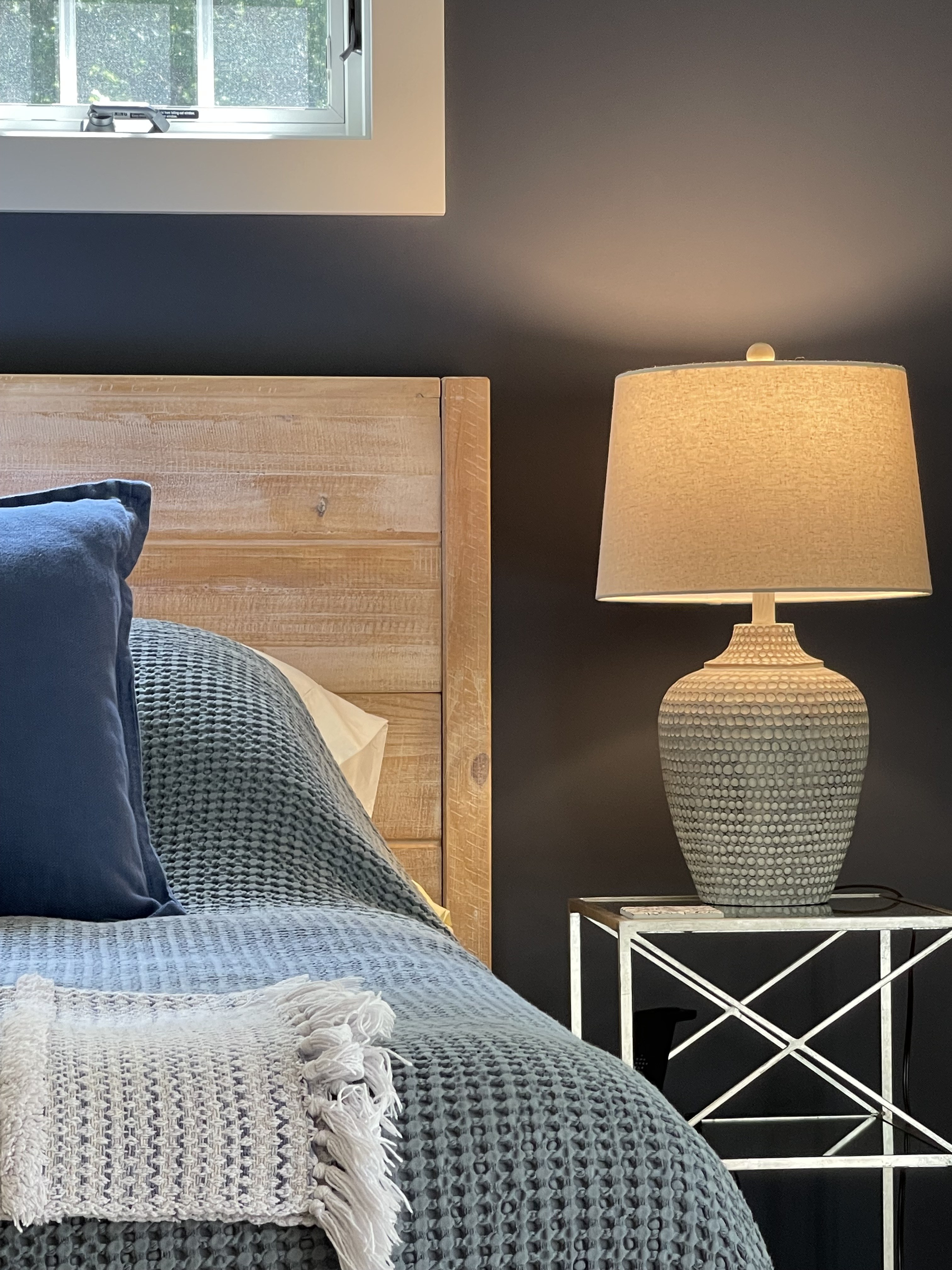 Bedside detail in the Beachglass Barn suite