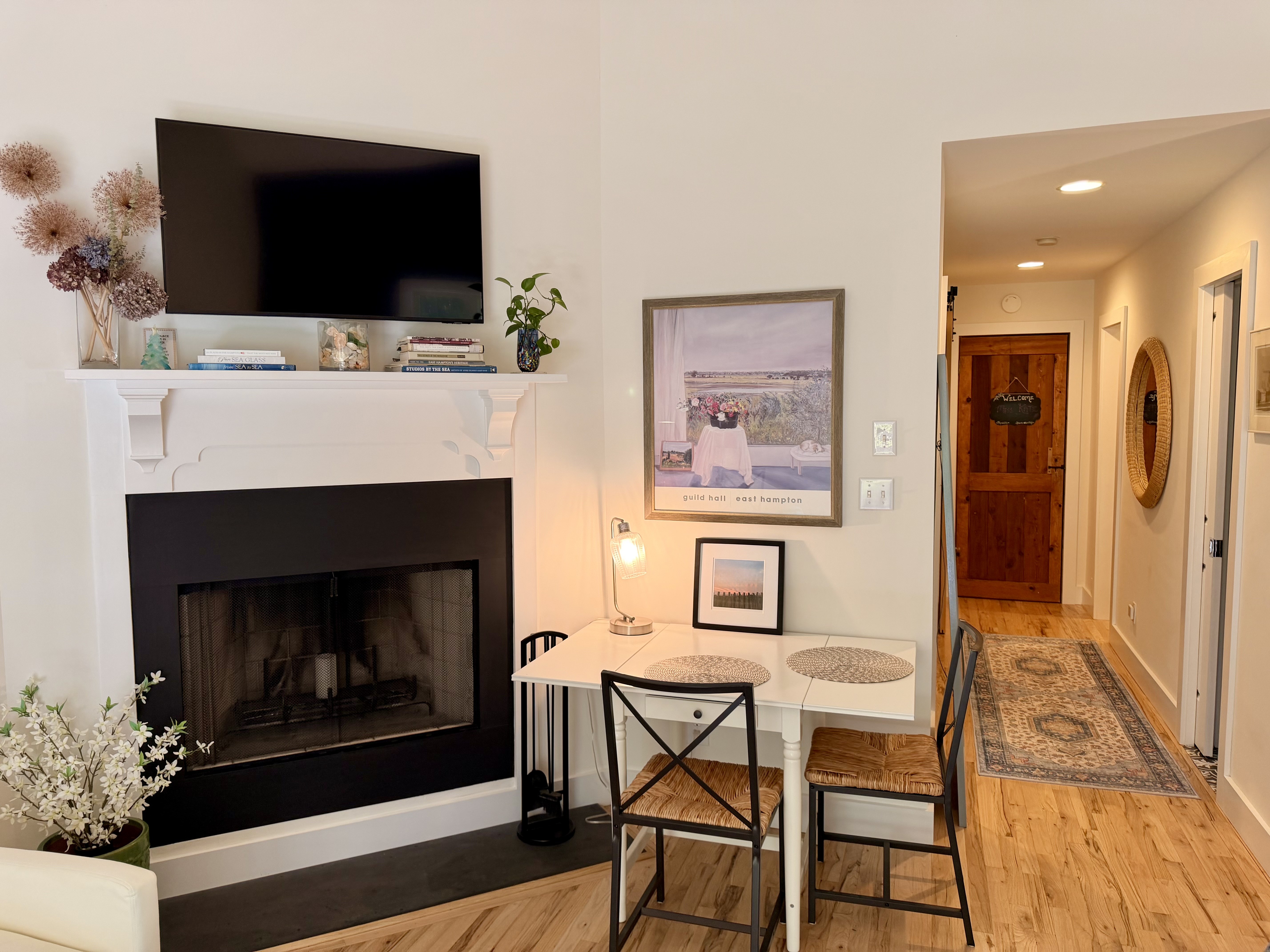 Fireplace and dining nook in the Beachglass Barn suite