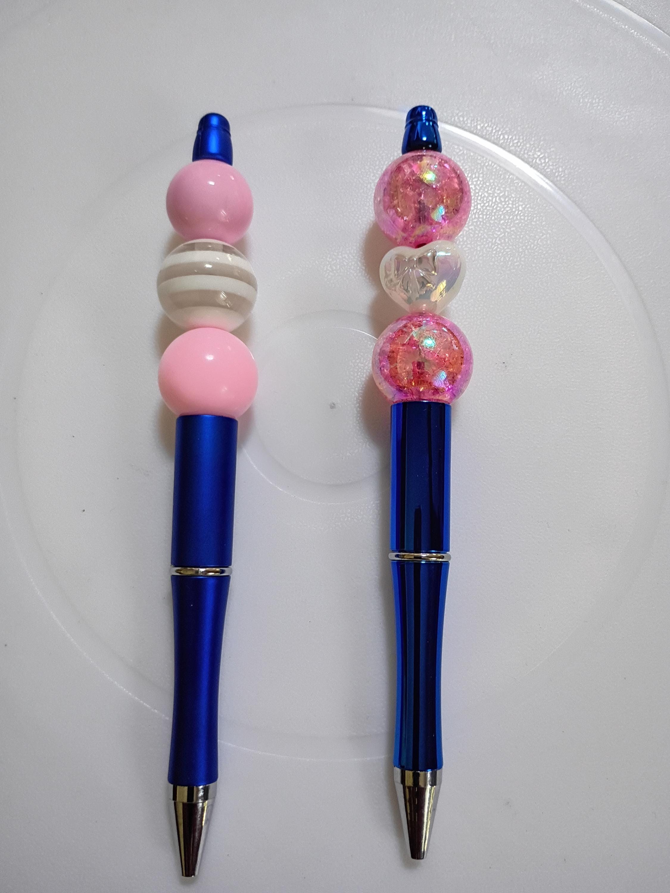 Beaded ink pens