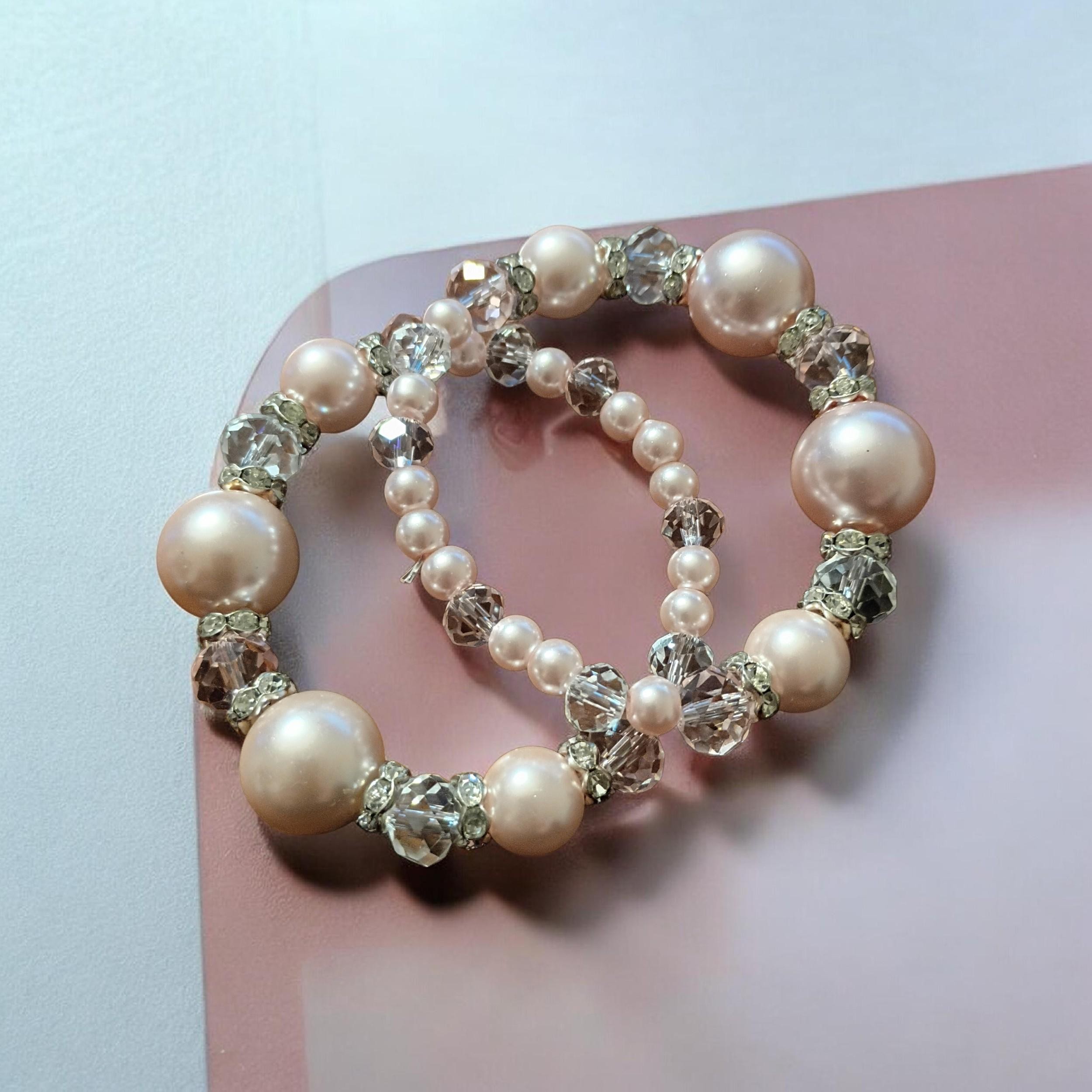 Indulge in the elegance of soft pink pearls paired with the brilliance of crystal glass beads., view 2