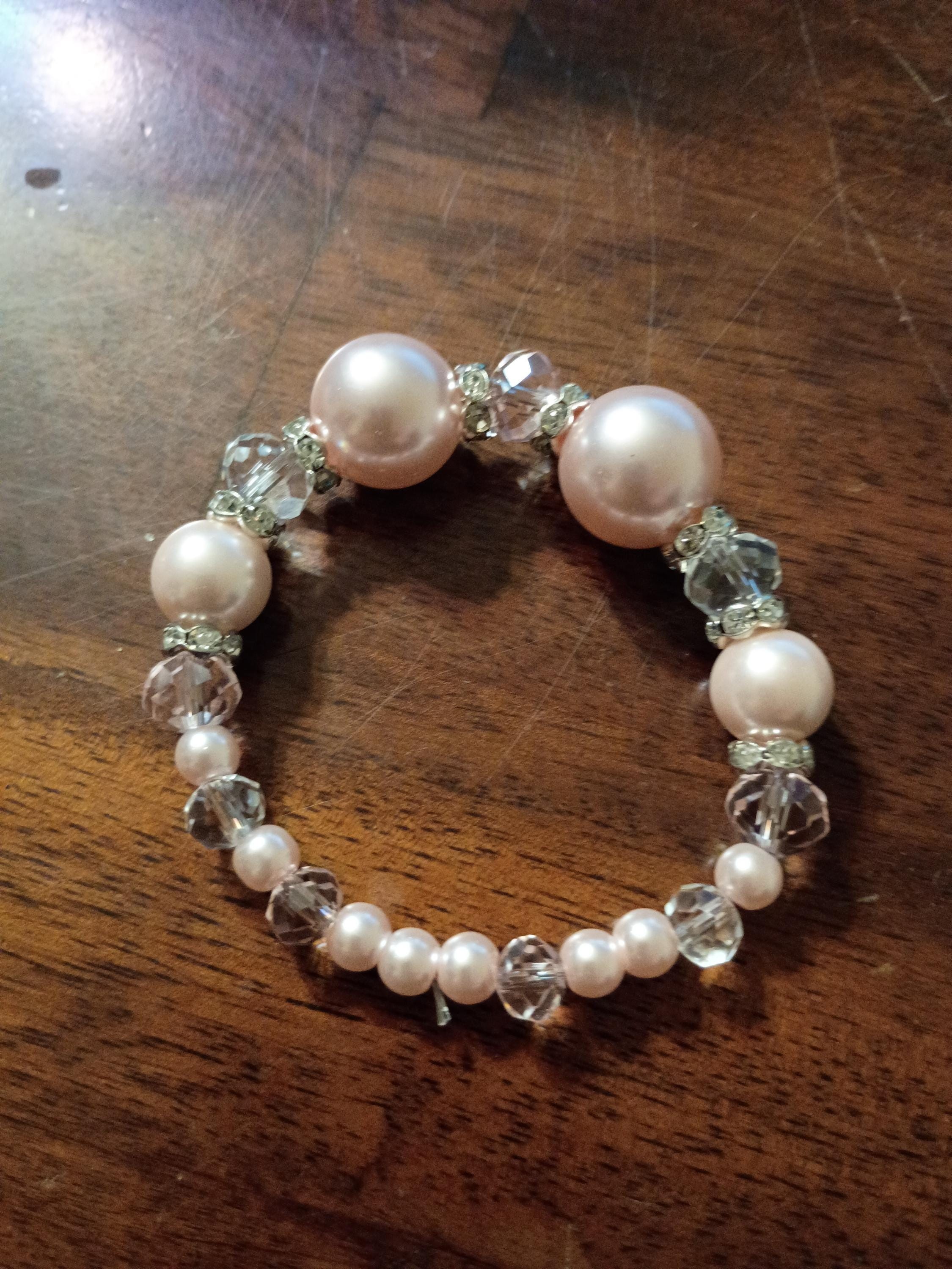 Indulge in the elegance of soft pink pearls paired with the brilliance of crystal glass beads., view 3