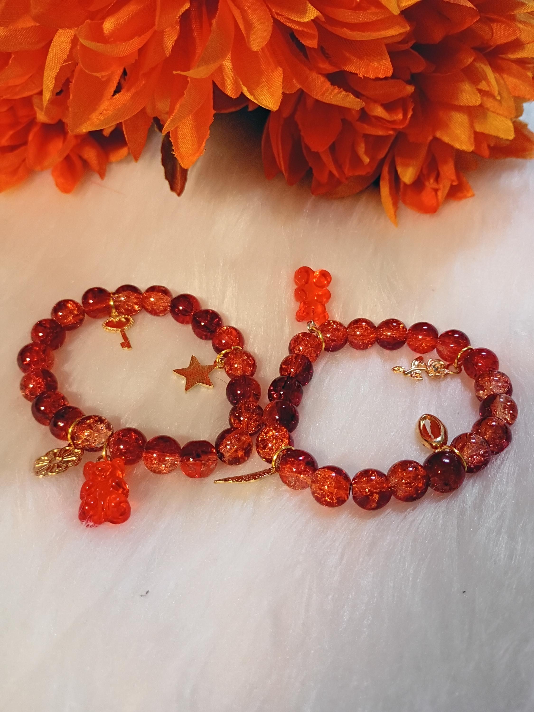 Orange beaded charm Bracelet