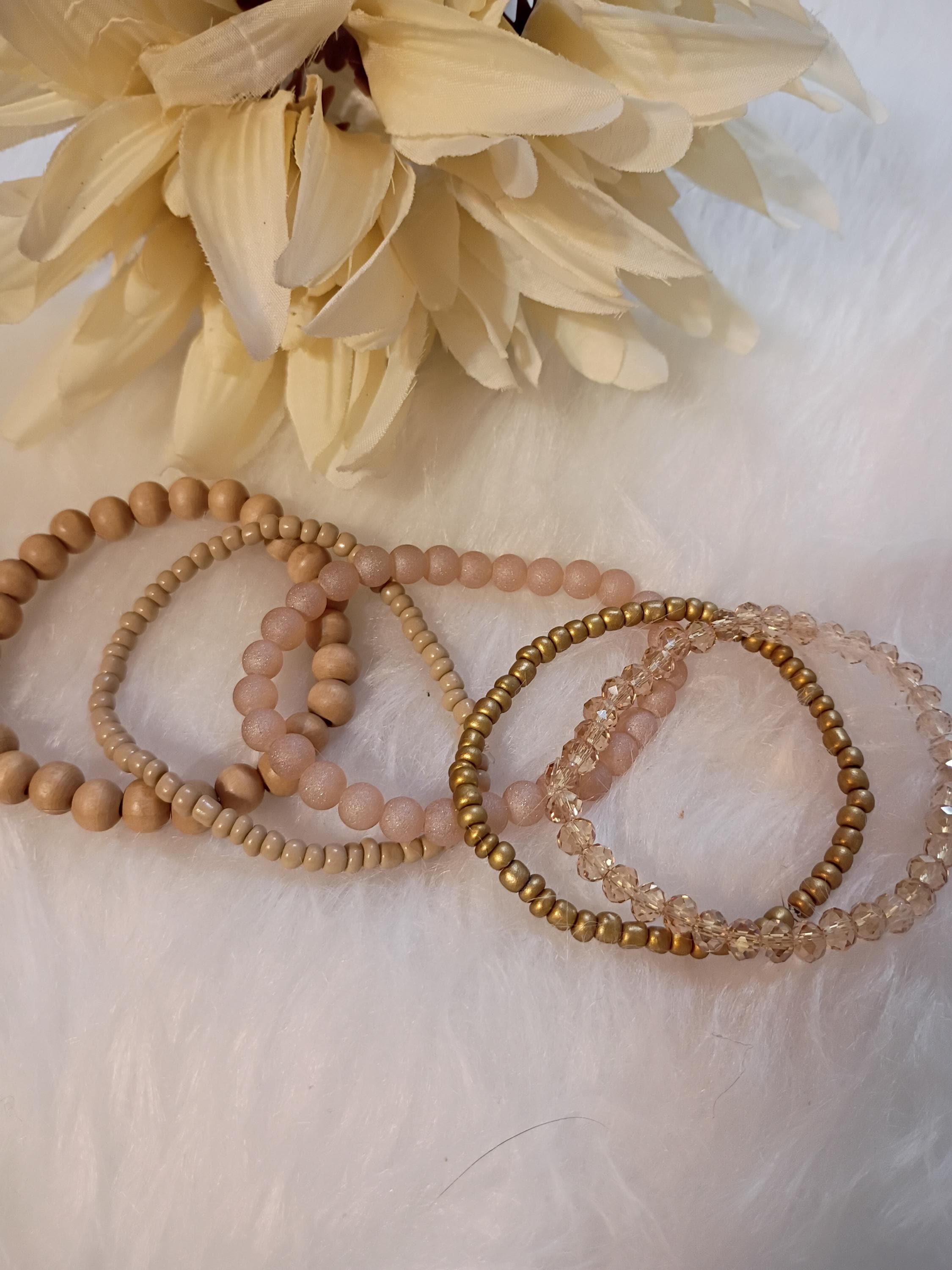 Set of brown stone beaded bracelets.