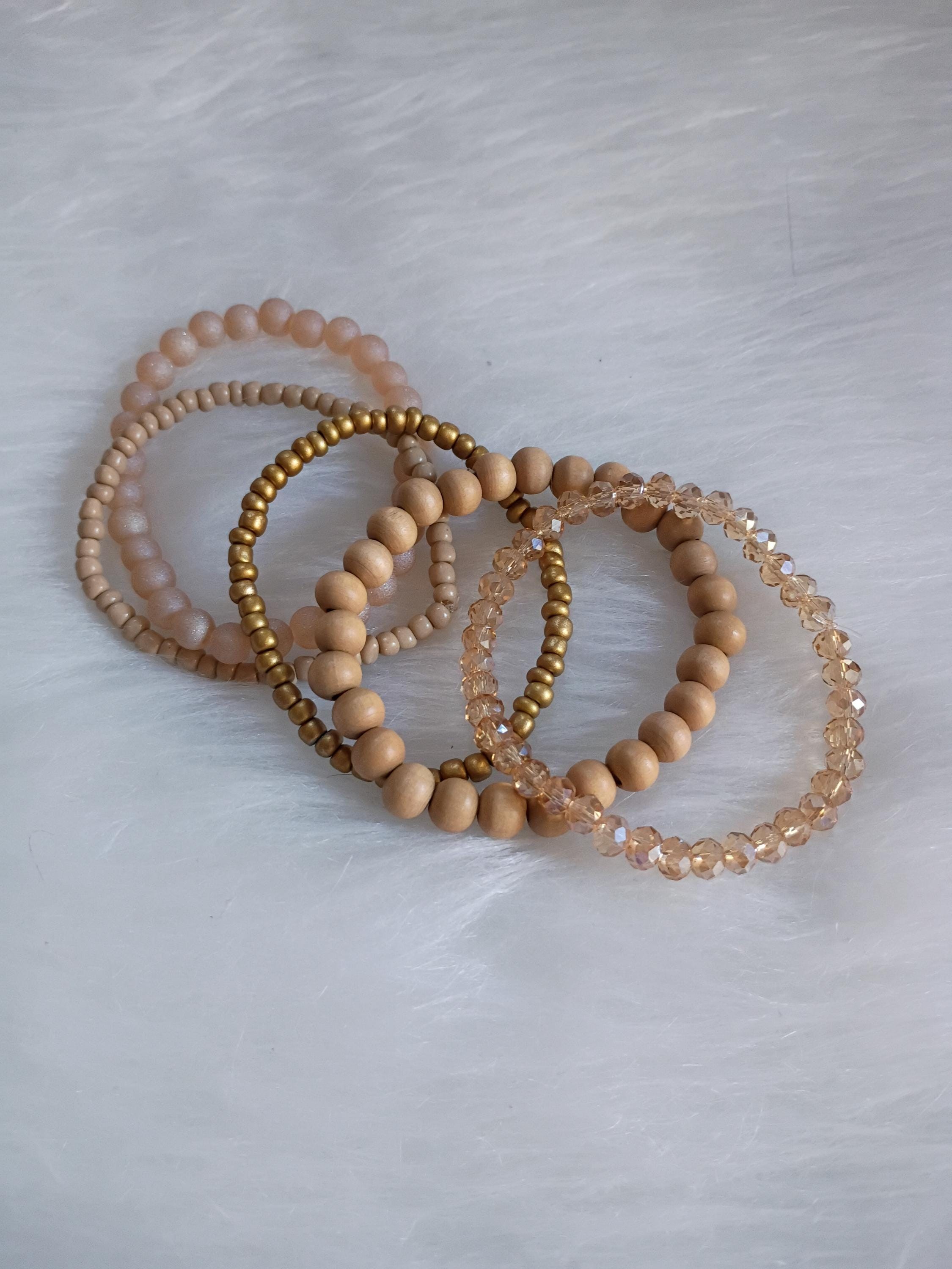Set of brown stone beaded bracelets., view 3