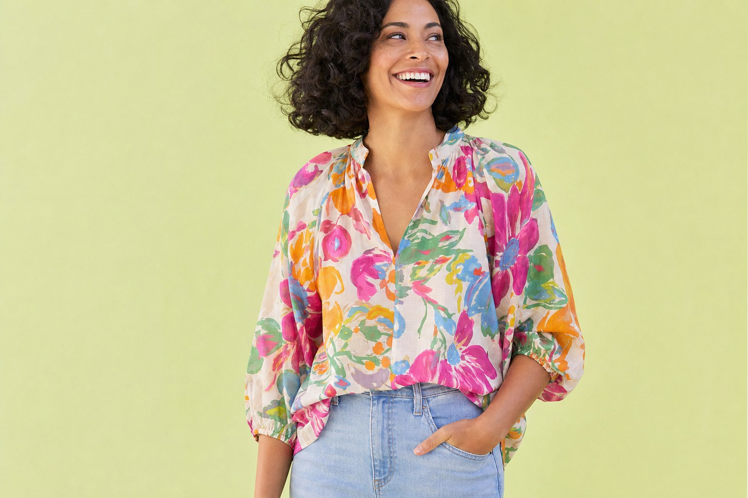 Woman wearing a colorful floral blouse