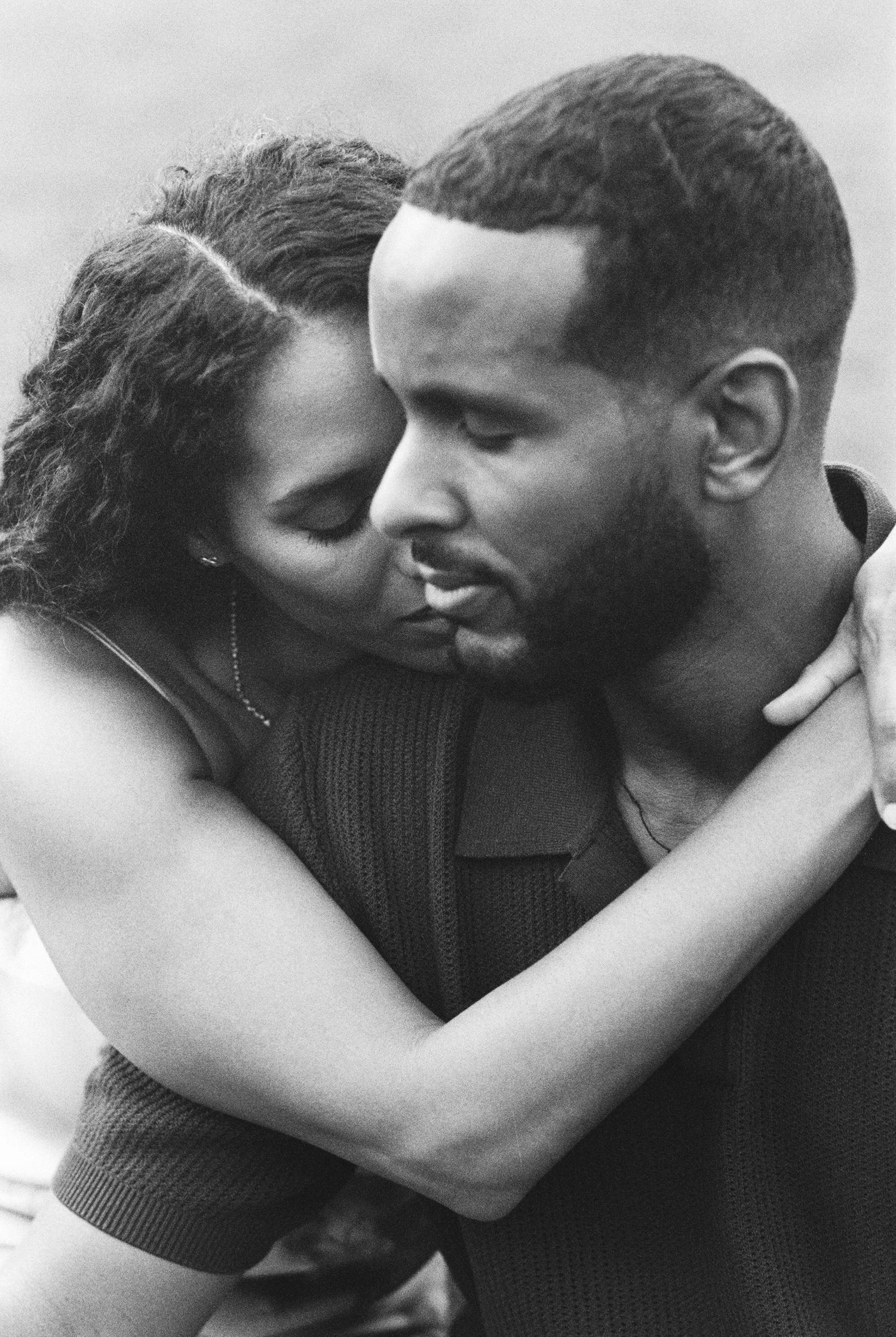Couple together at home during a Baltimore engagement session
