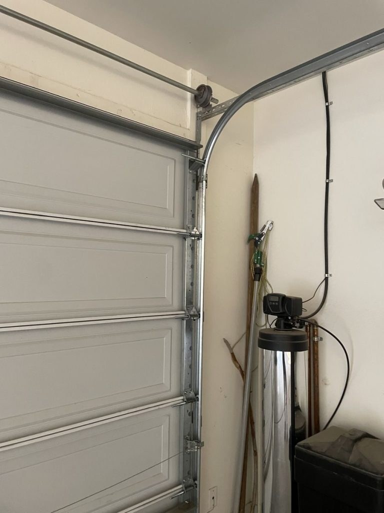 New smooth-rolling garage door rollers after repair