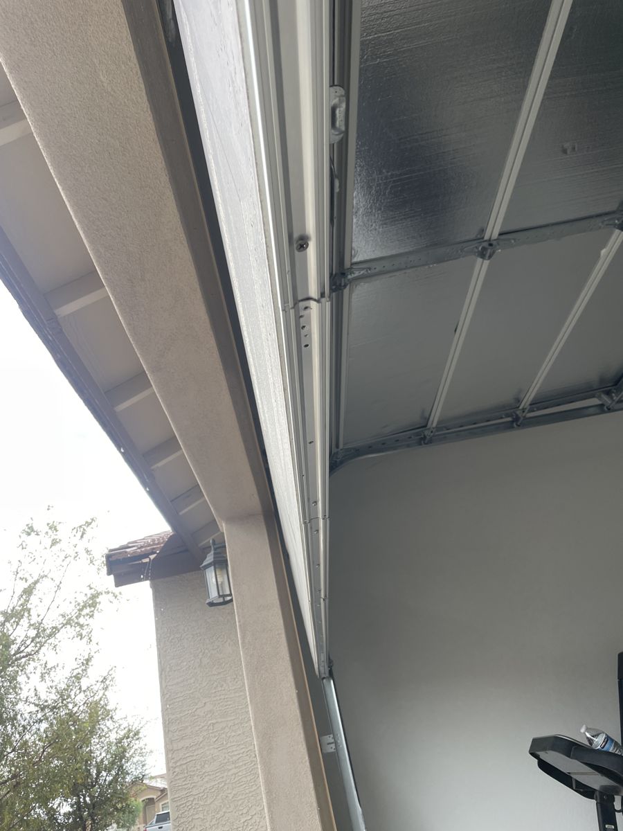 Worn garage door bottom seal before replacement