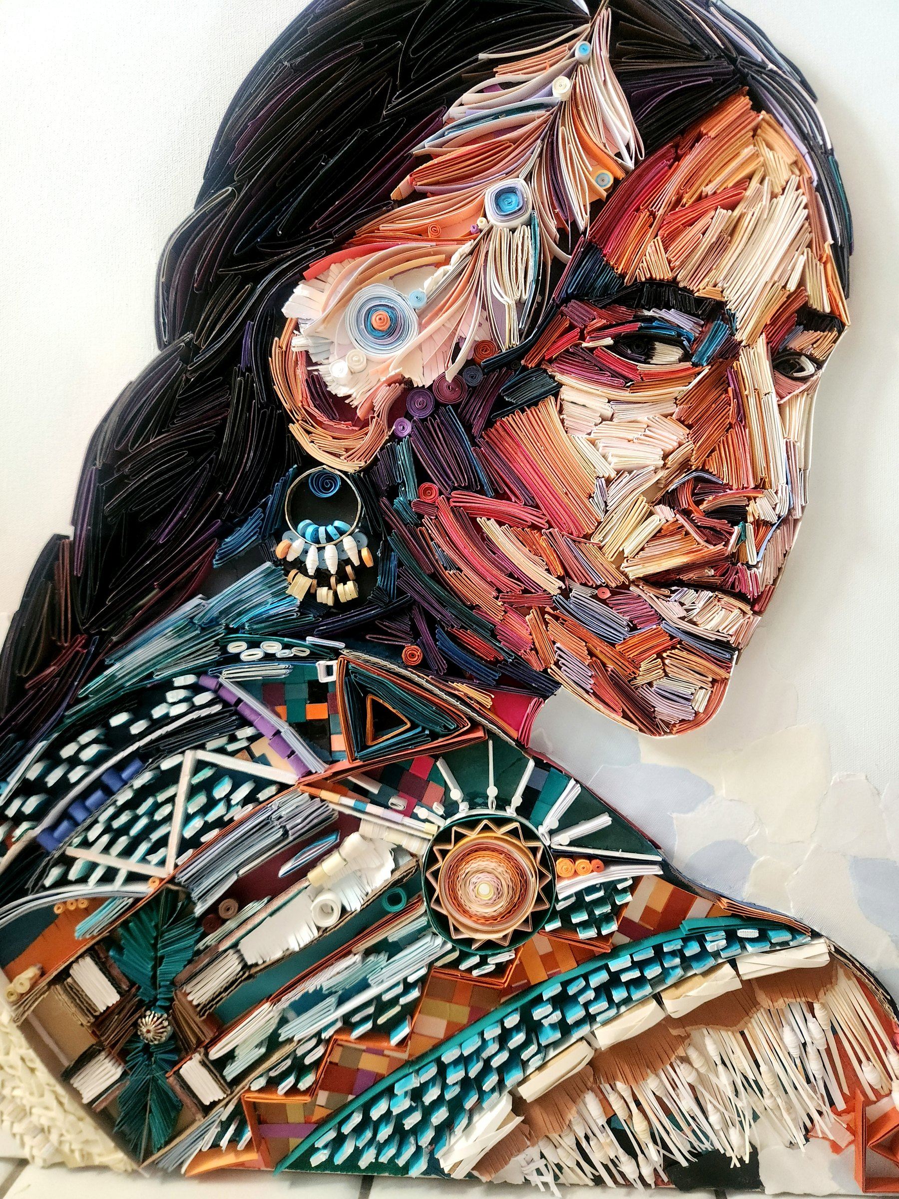 A dimensional paper portrait in profile by Kairee Cardoso