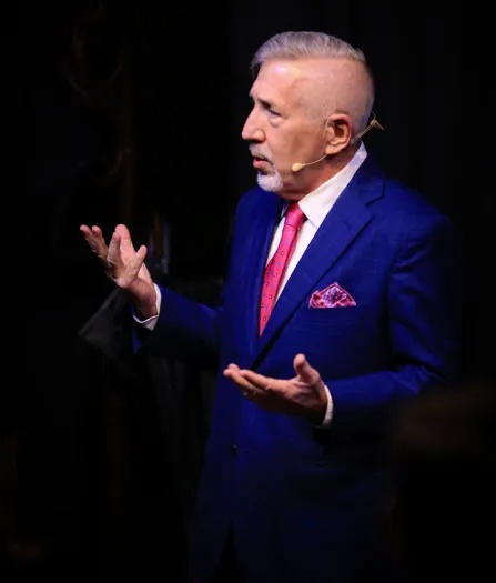 boB performing for guests at a corporate event