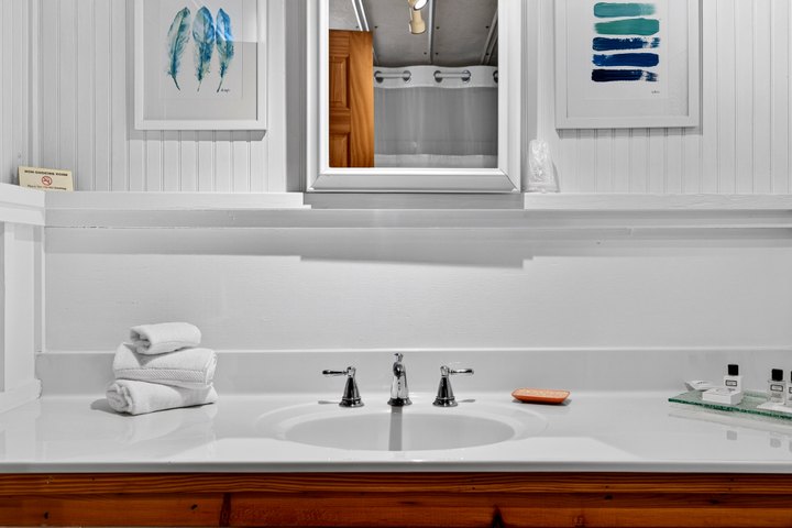 Farmhand Cabin: Bathroom vanity and mirror