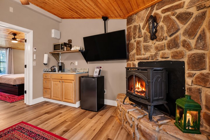 Hearthstone: Stone fireplace beside the kitchenette