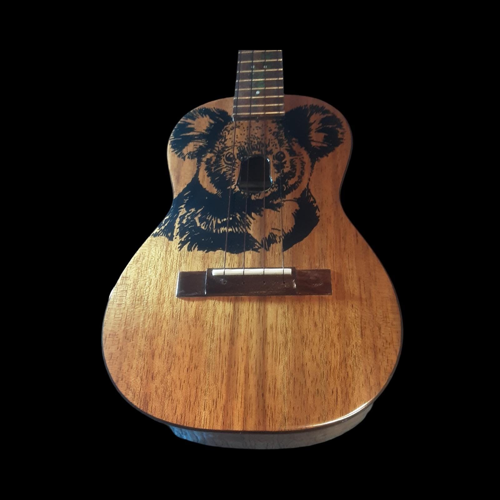 Koala inlay detail on koa tenor ukulele