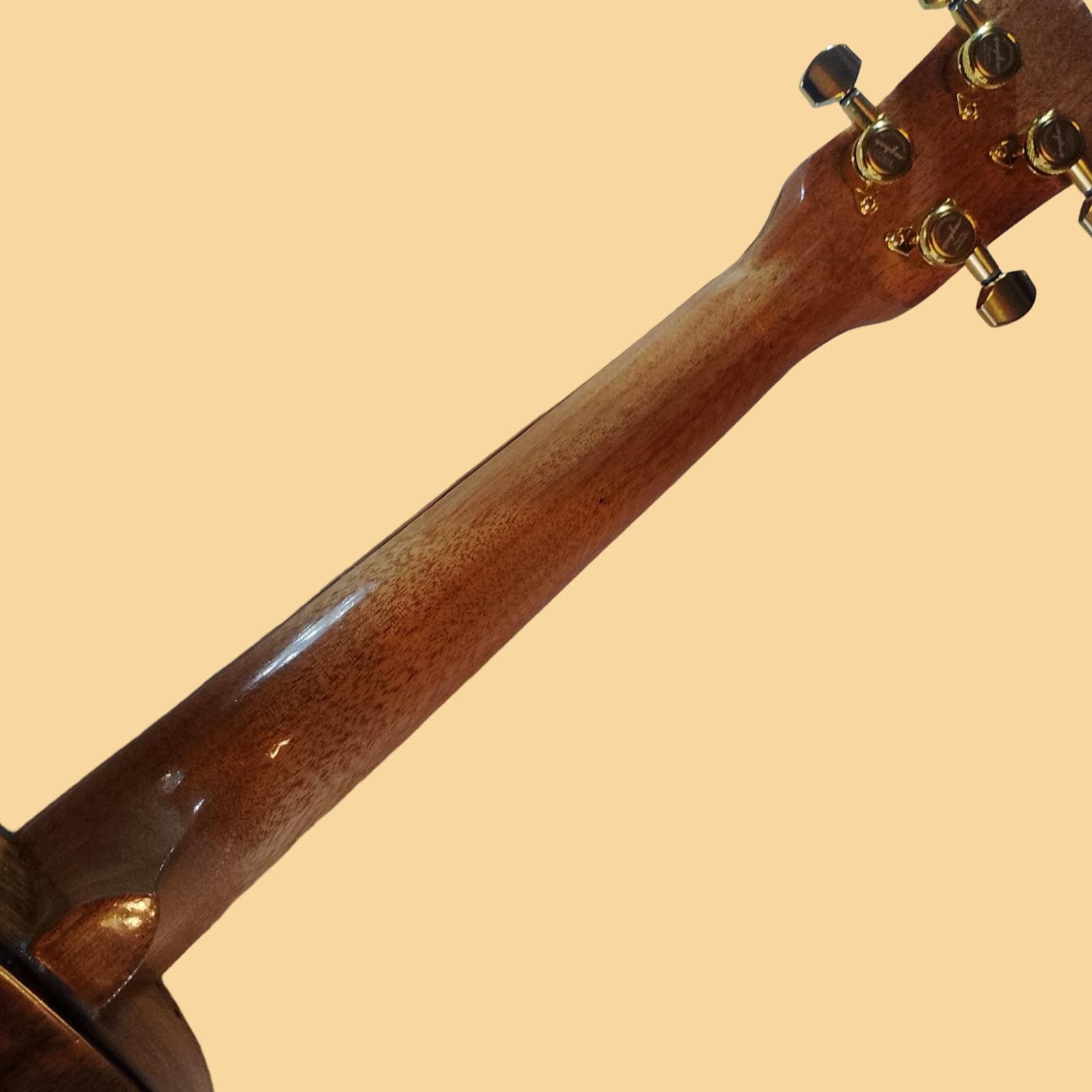 Koa tenor ukulele bridge