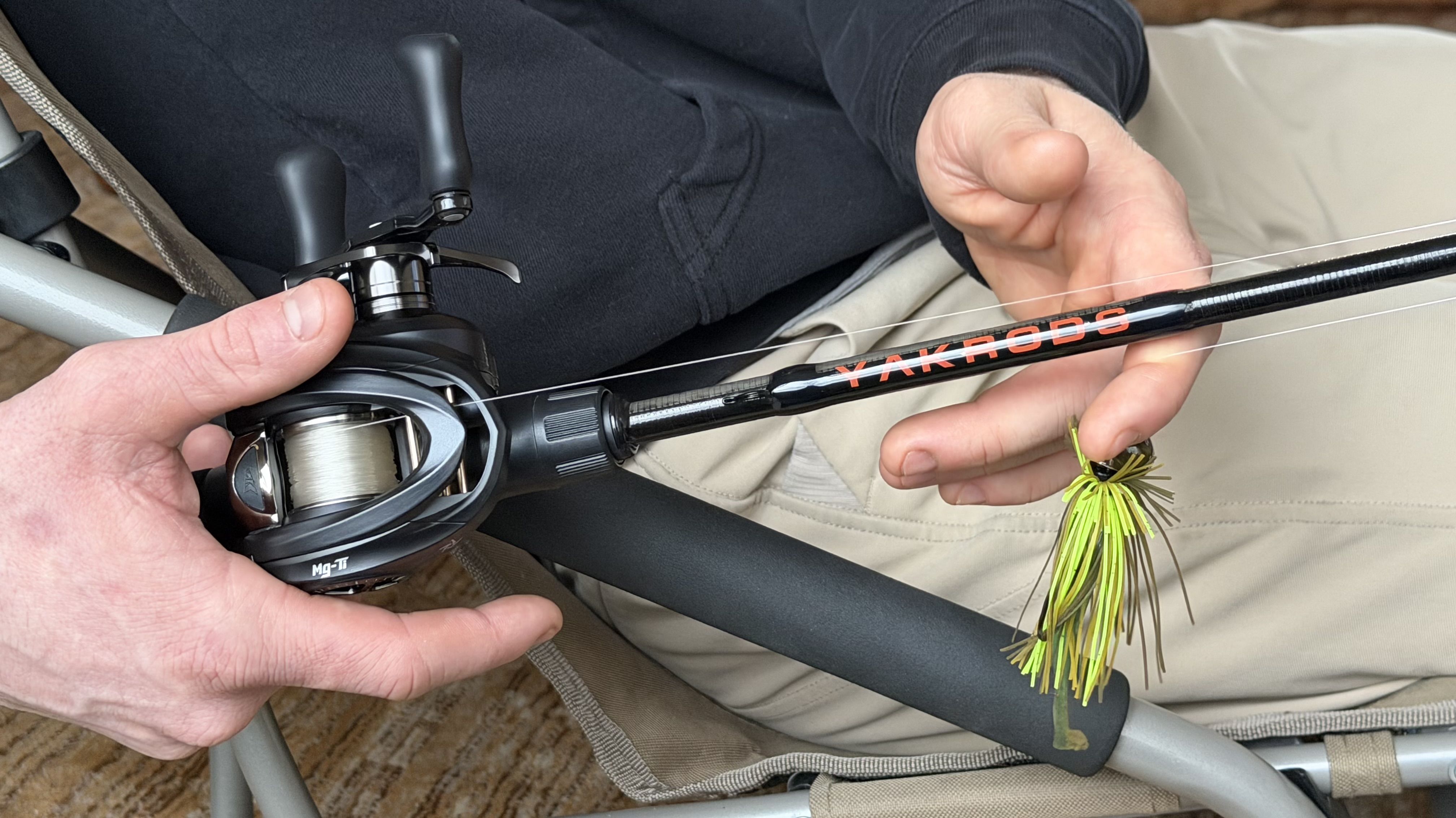 Yakrods casting rod with a baitcasting reel and chartreuse jig