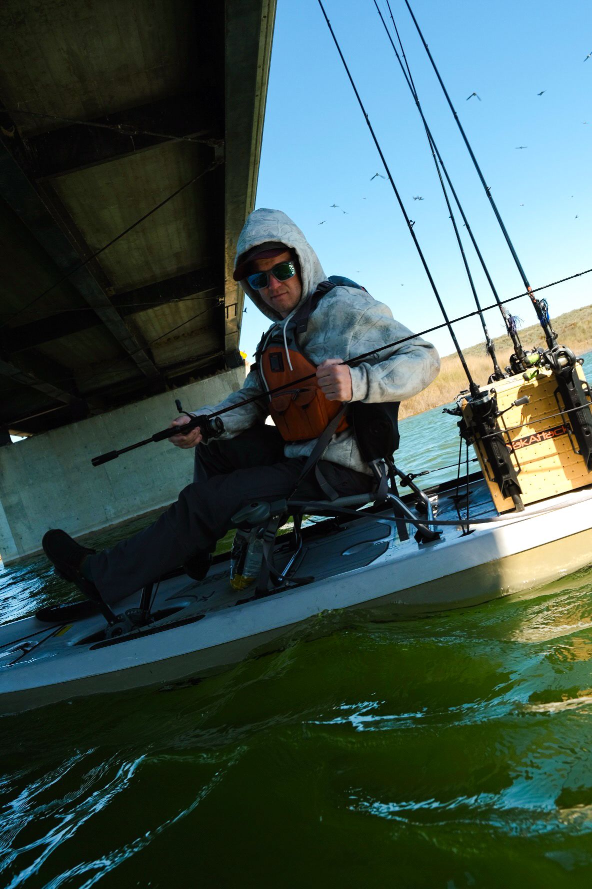 Spinning rod in use on the water