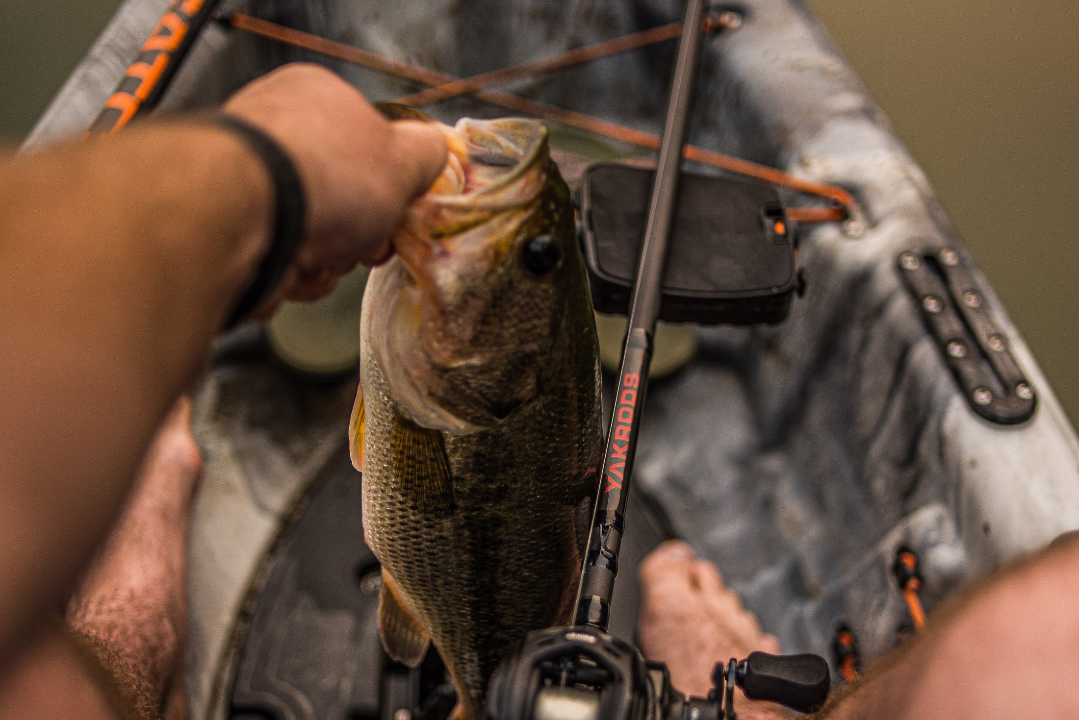 Yakrods rod and a caught fish in a kayak