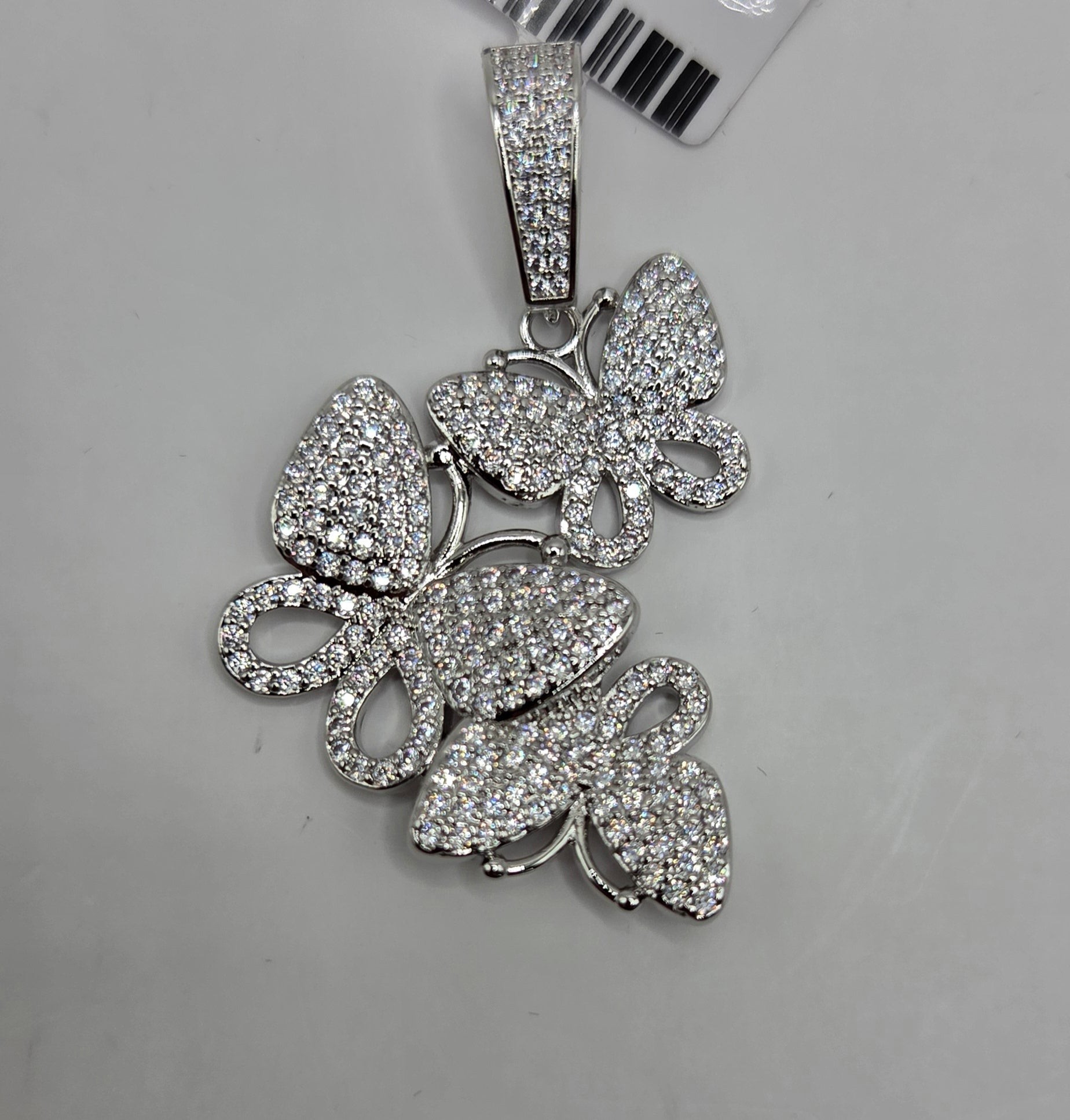Gold-filled butterfly pendant with clear crystal details