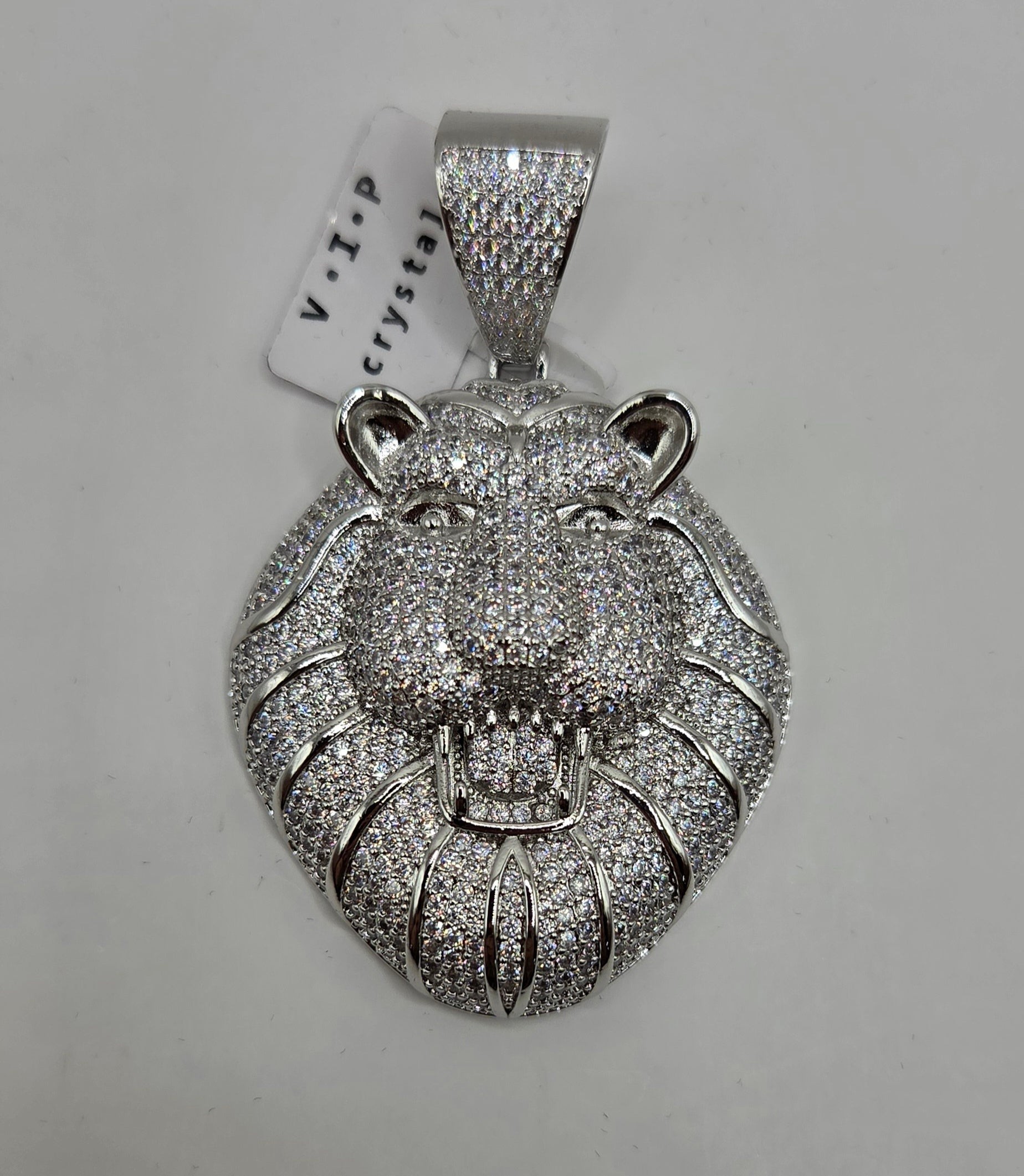 Gold-filled lion pendant with clear crystal details