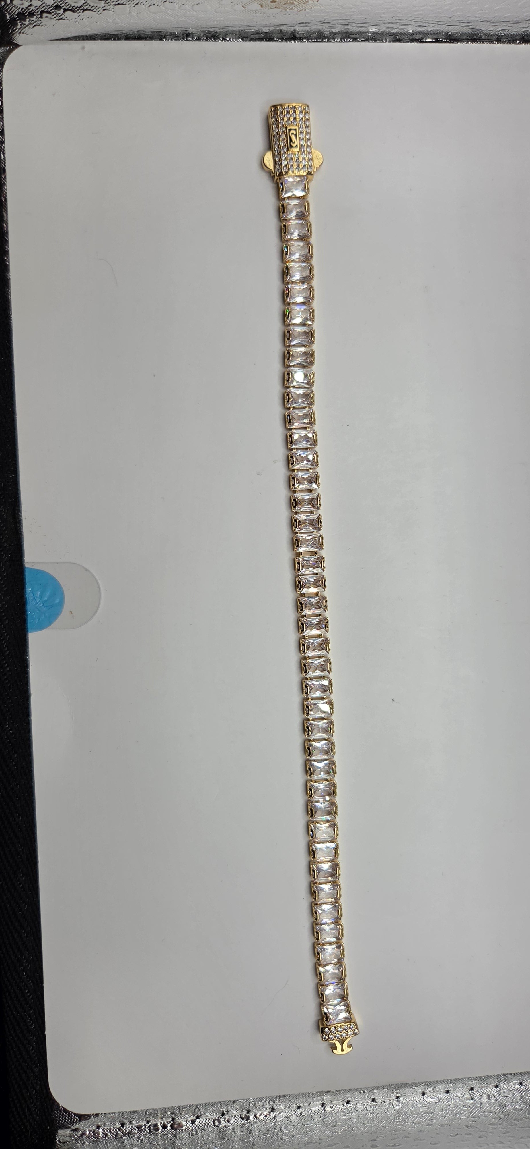 Gold bracelet with hand-set crystal details