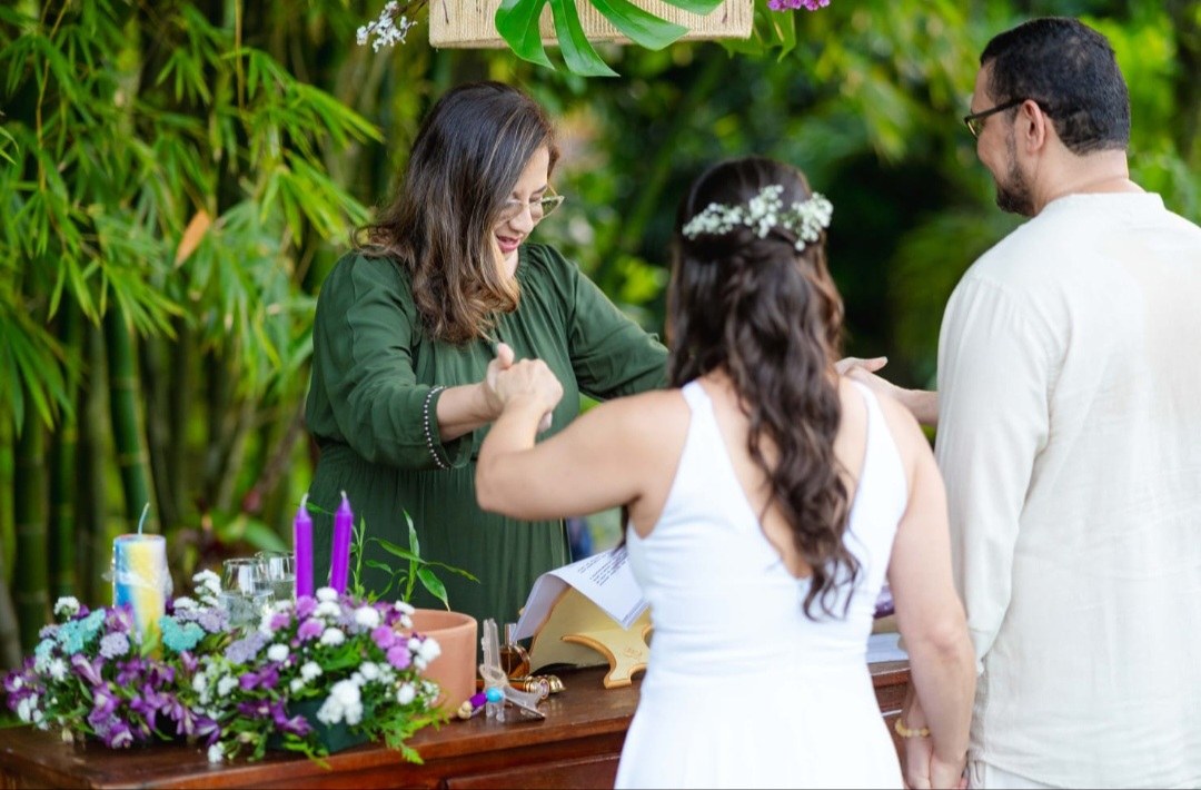 A wedding ceremony held in a garden setting