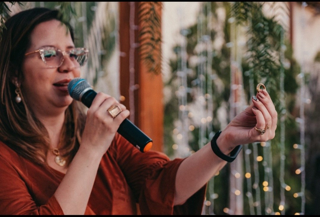 A wedding officiant speaking during a ceremony