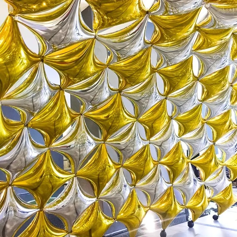 Gold balloon wall for a Seaside Beach event