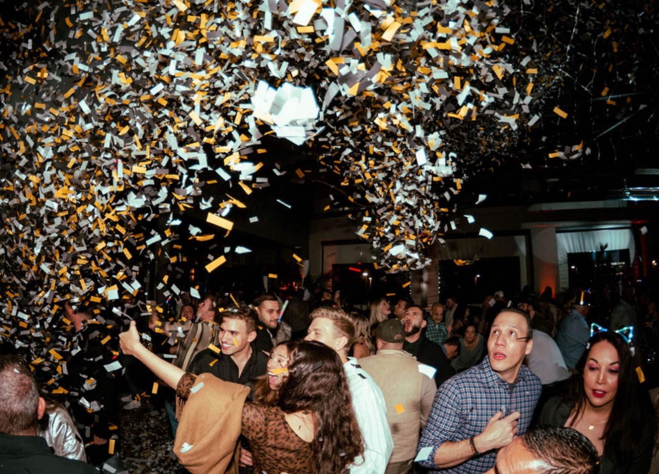 Confetti falling over a celebration crowd