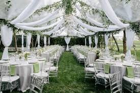 Beach wedding ceremony arch with fabric draping
