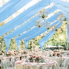 Lavender fabric ceiling draping for a wedding reception