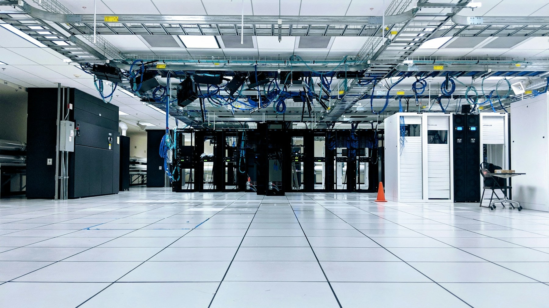 Technology specialist working in a server room